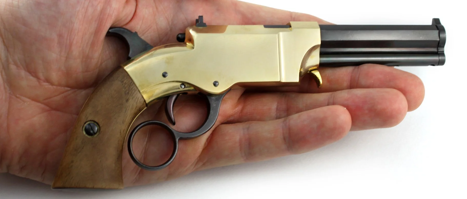 VOLCANIC PISTOL miniature in palm.jpg