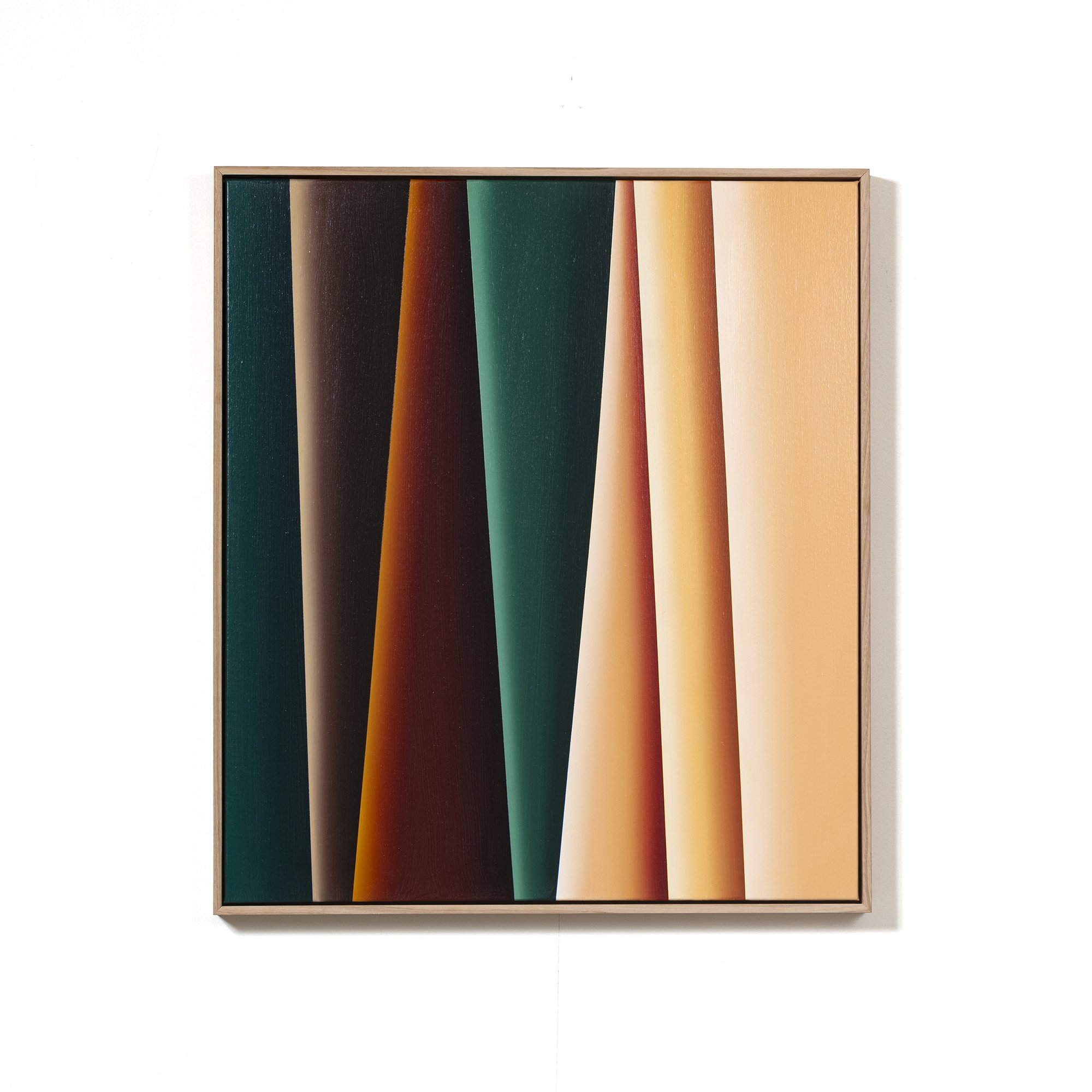 Abstract artwork with vertical color gradients in a wooden frame, transitioning from dark green and black on the left to light peach and beige on the right, hung on a white wall.