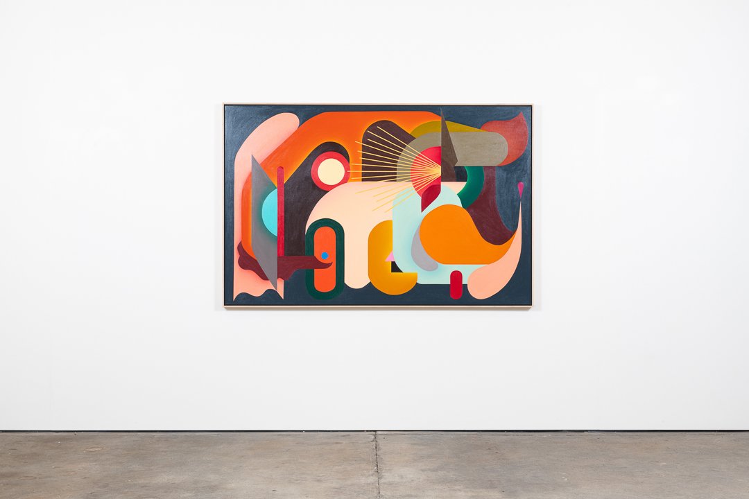 Colorful abstract painting with geometric shapes on a white gallery wall.