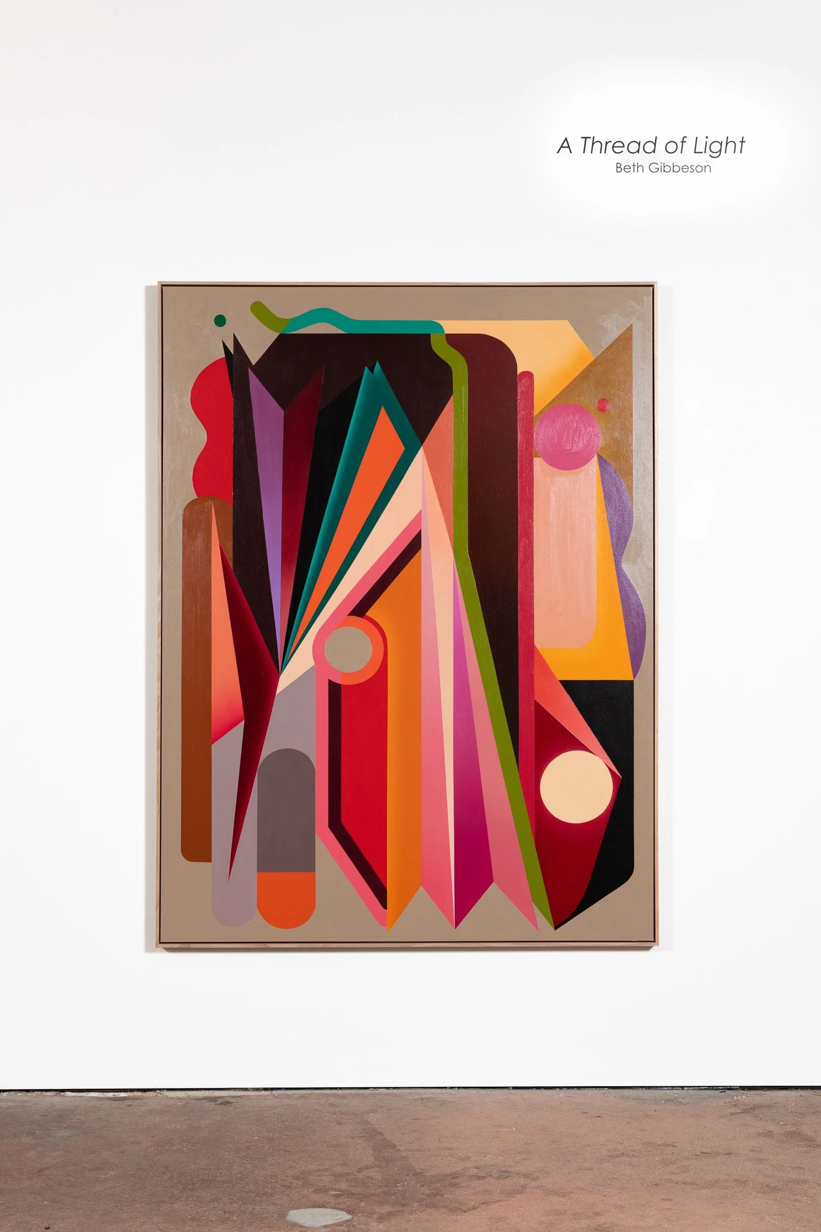 Abstract colorful geometric painting titled 'A Thread of Light' by Beth Gibbons hanging on a white gallery wall.