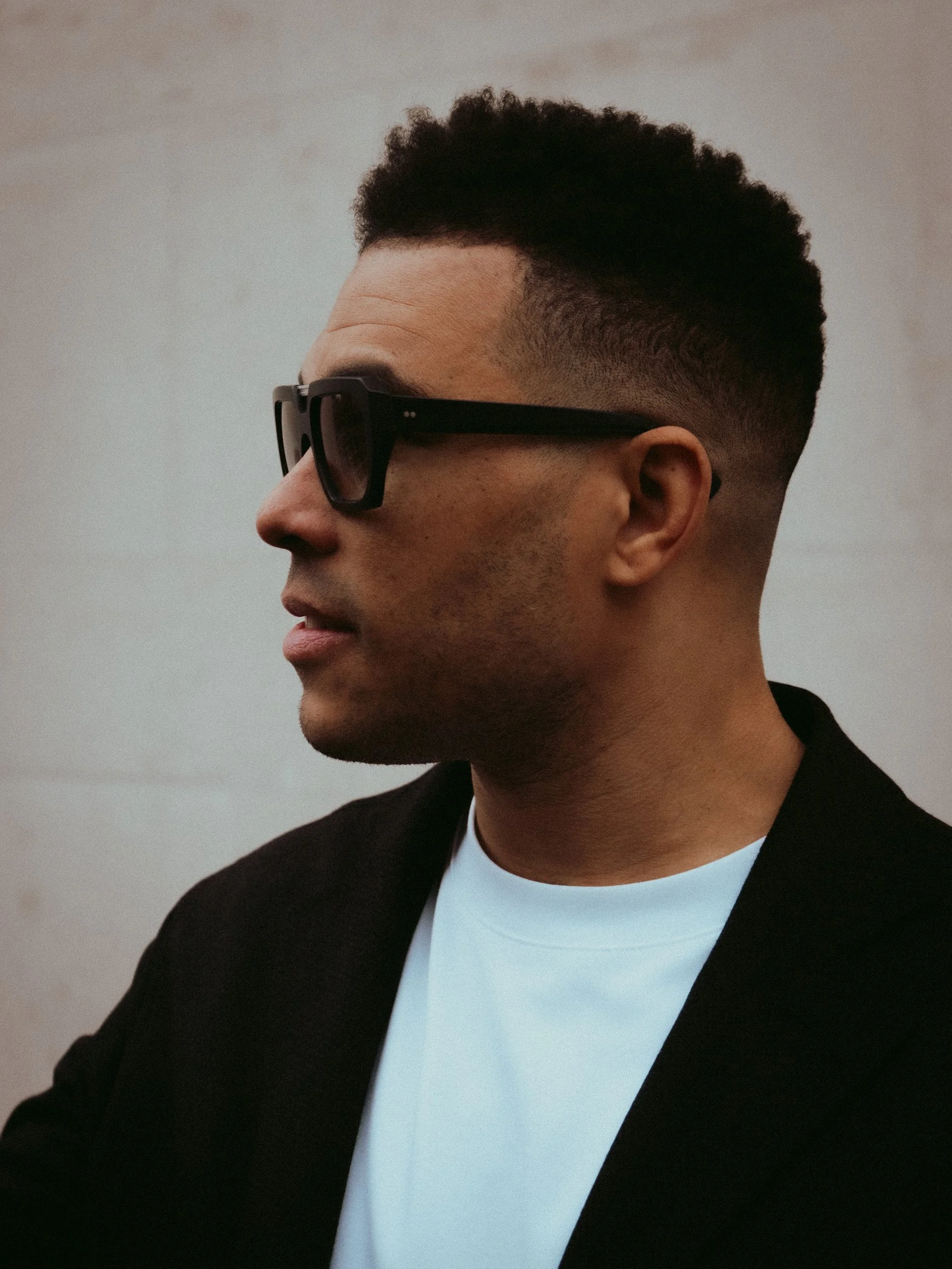 Side profile of a man in Kirk & Kirk sunglasses