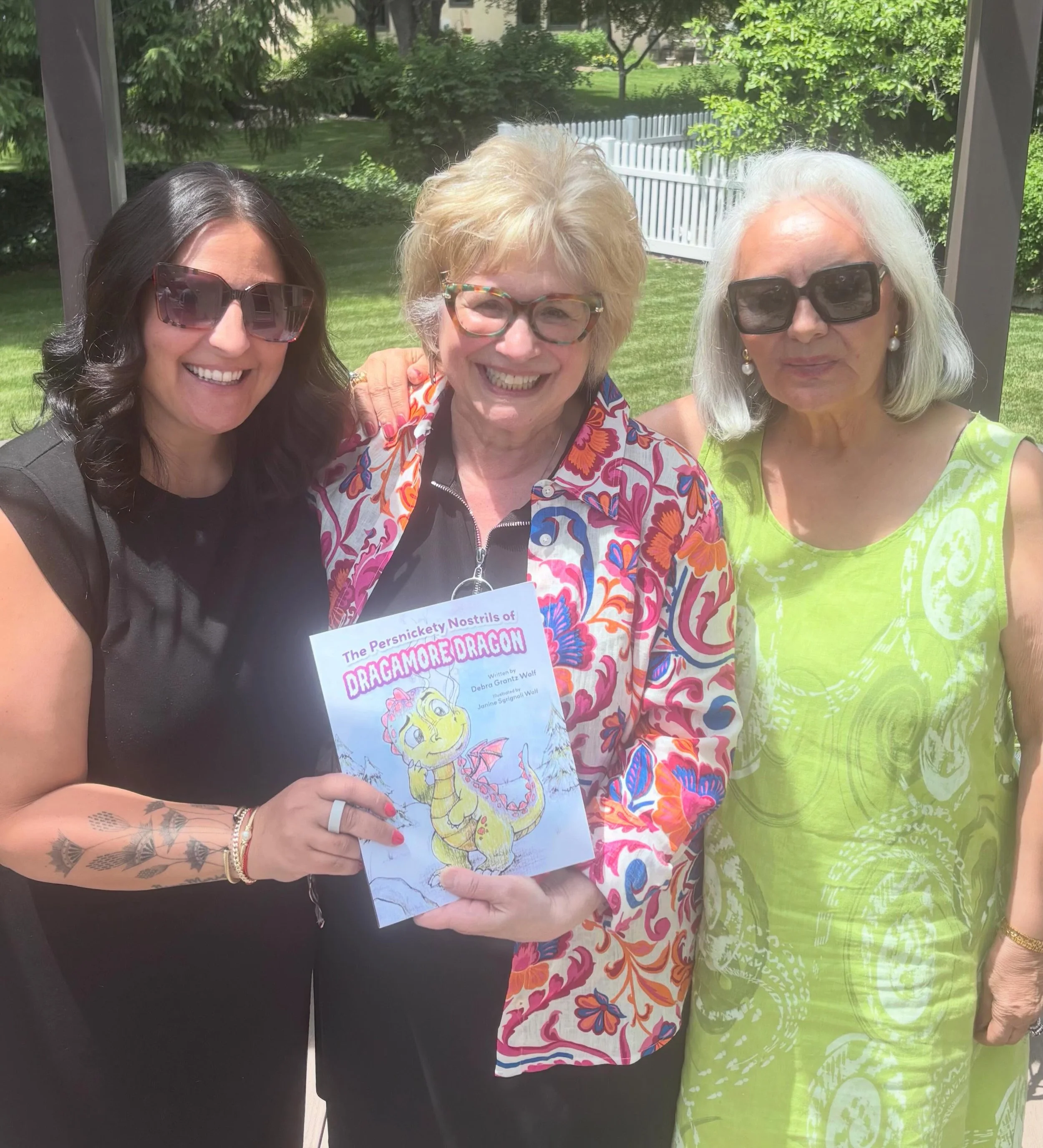 What's a launch party without Two Hotties Biscottis!  We are so excited to share that our friend Debra Grantz Wolf just released her children's book, The Persnickety Nostrils of Dragamore Dragon, today. It is a snowy picture-book adventure about big 