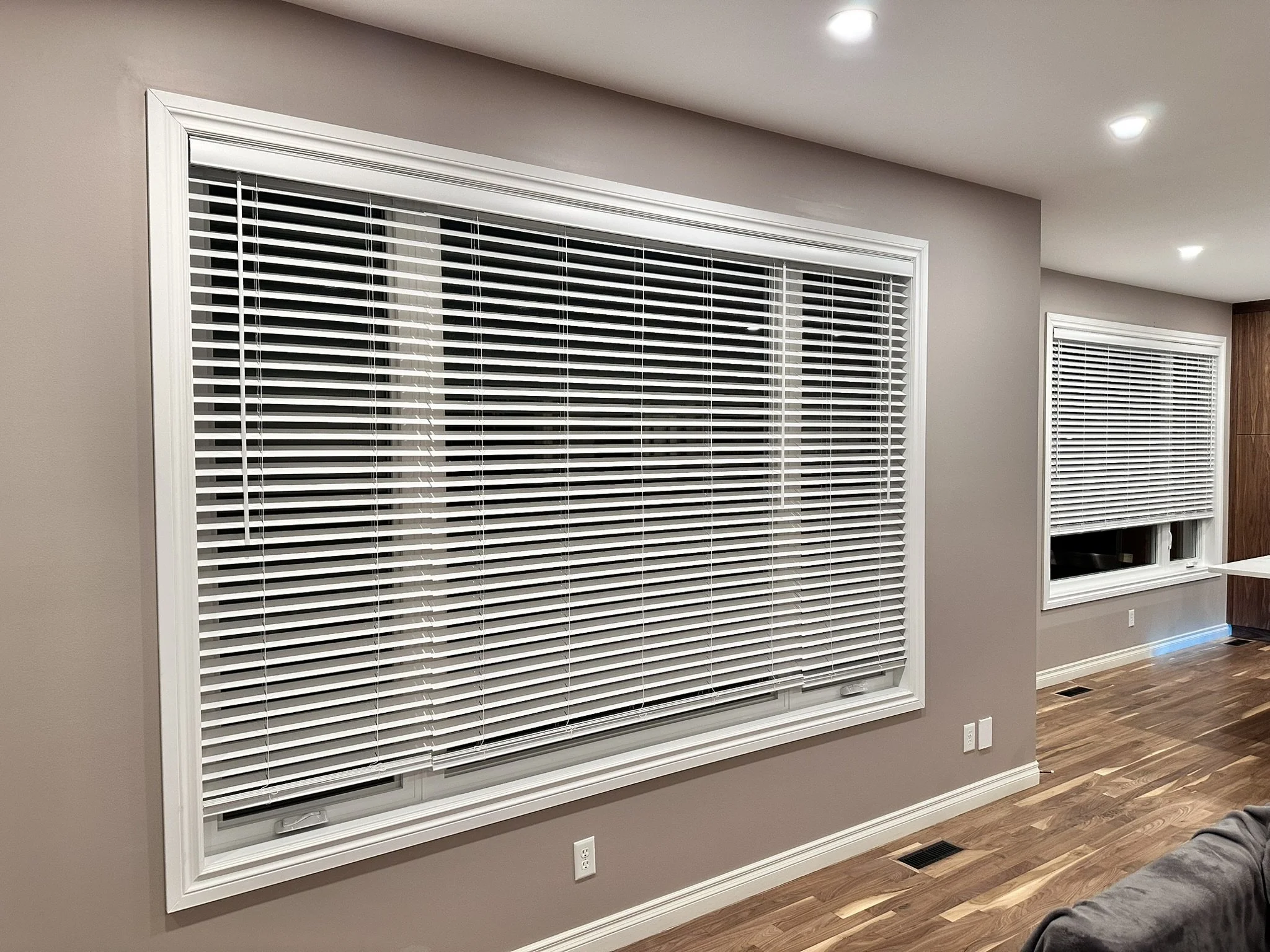 Wide Faux Wood Blinds installed in living room