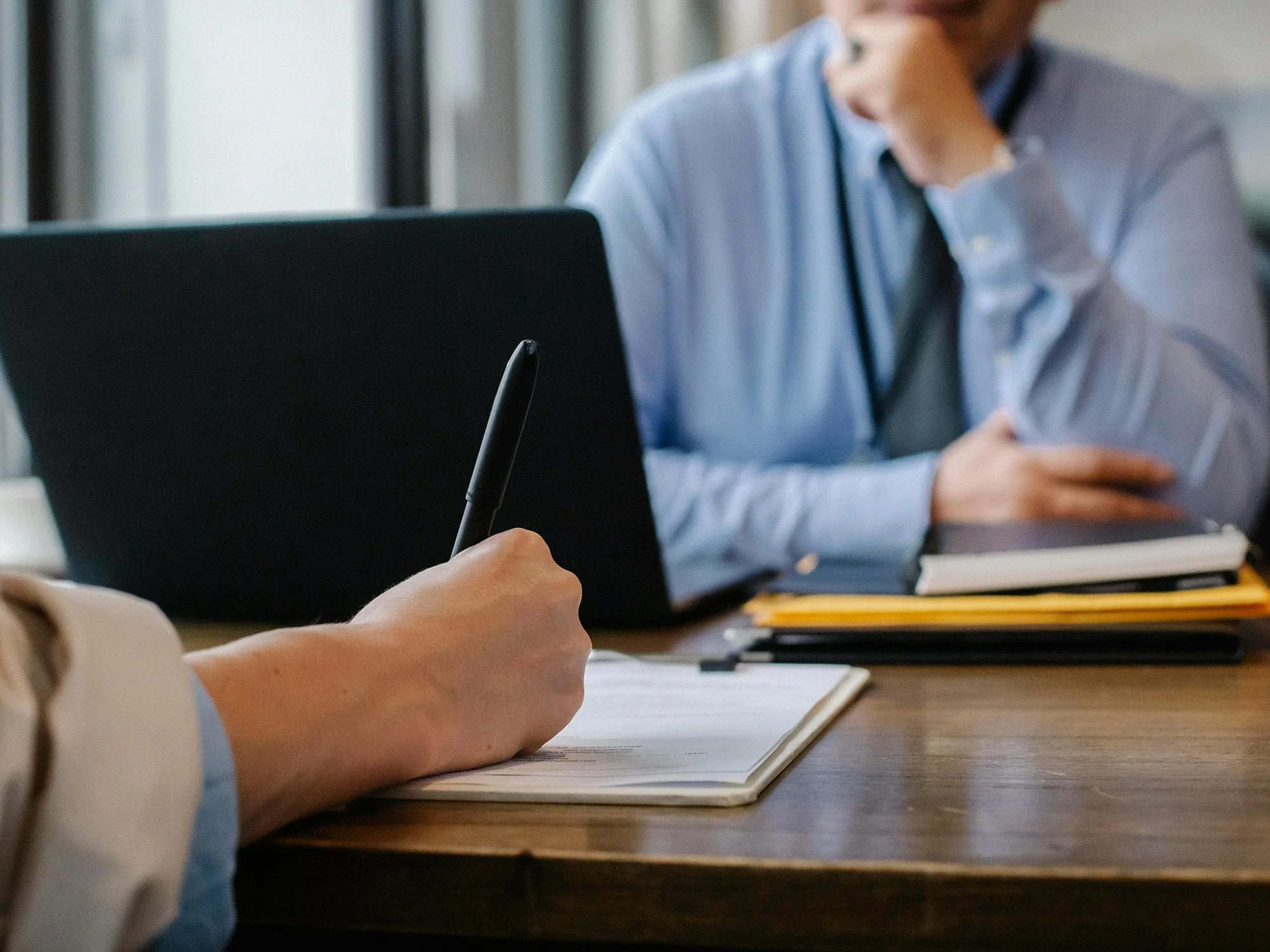 Financial adviser discussing personalised financial strategies with a client