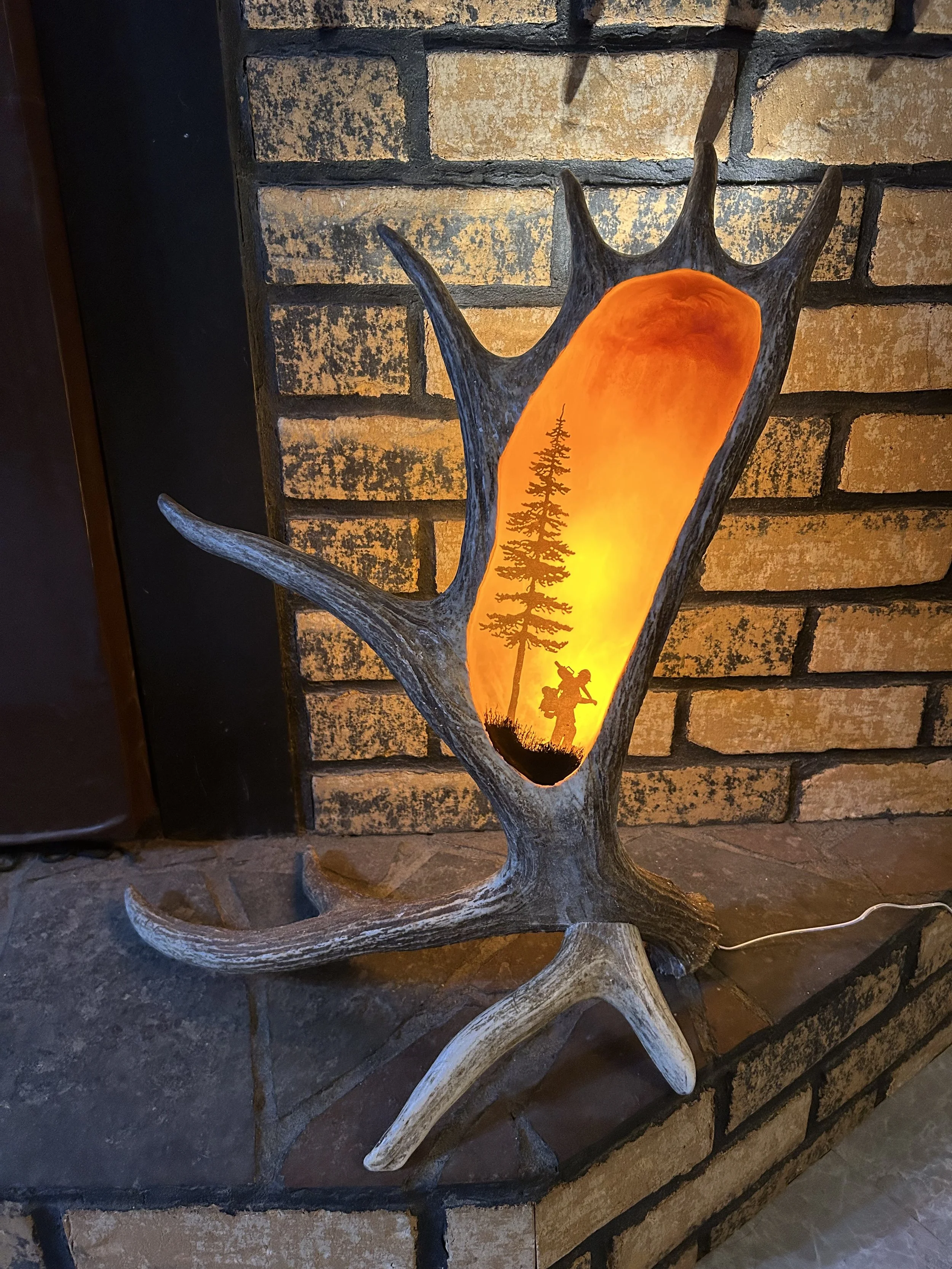 Wildland firefighter with lamp