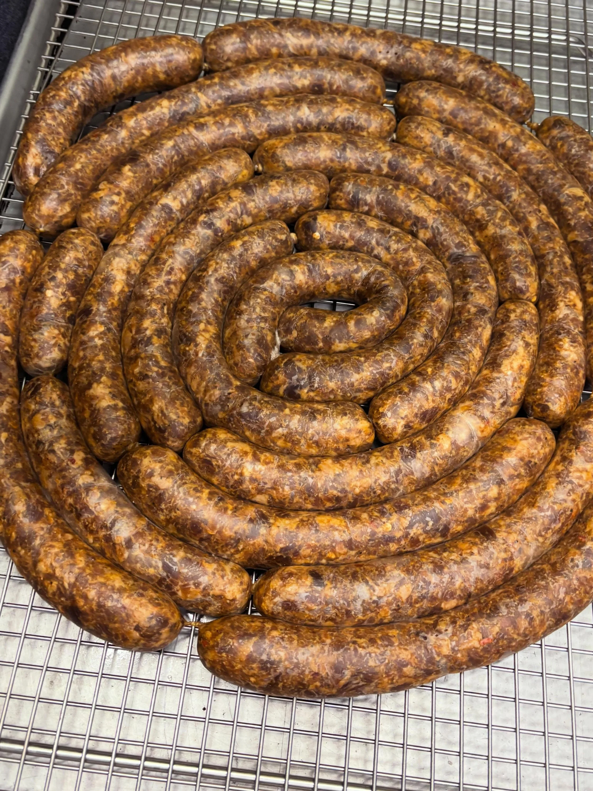 The kitchen will be open this week 11-7 Thursday-Saturday and 11-6 on Sunday with a full menu. 
Not only do we make all of our sides, sauce and banana pudding in house but our beef hot links and jalape&ntilde;o cheddar sausage are made in house also.