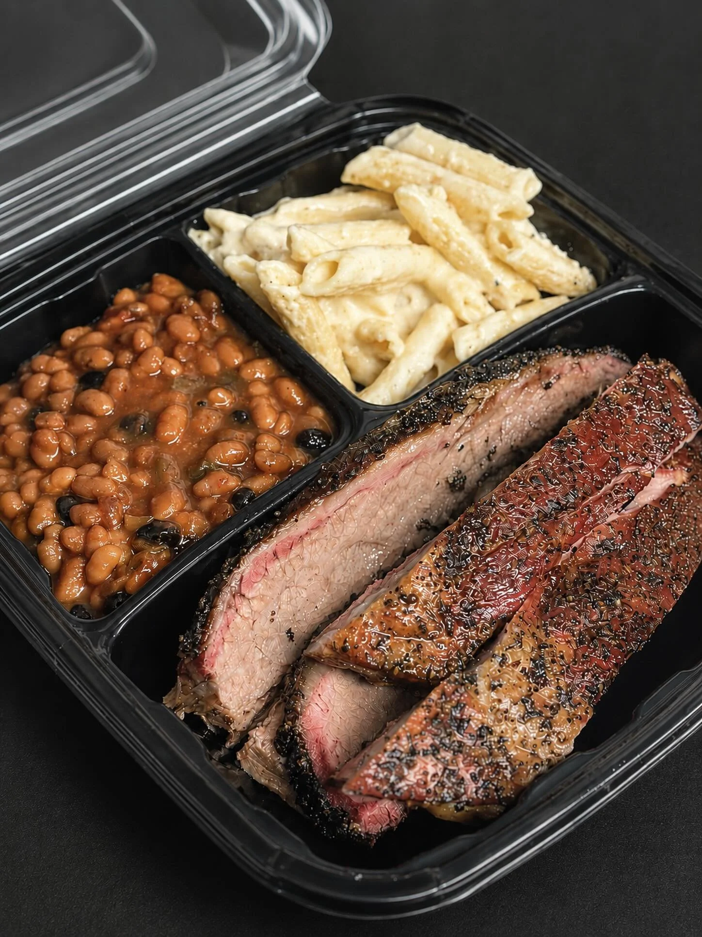 Our two meats and two sides platter gives you options if you are new to our menu or if you are a regular, stack it with your favs for the perfect combo meal. Designed for two people, it also works for one person plus leftovers. 

We are open until 7p