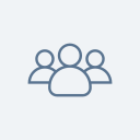 Icon of three people with a single person in front, representing a group or team