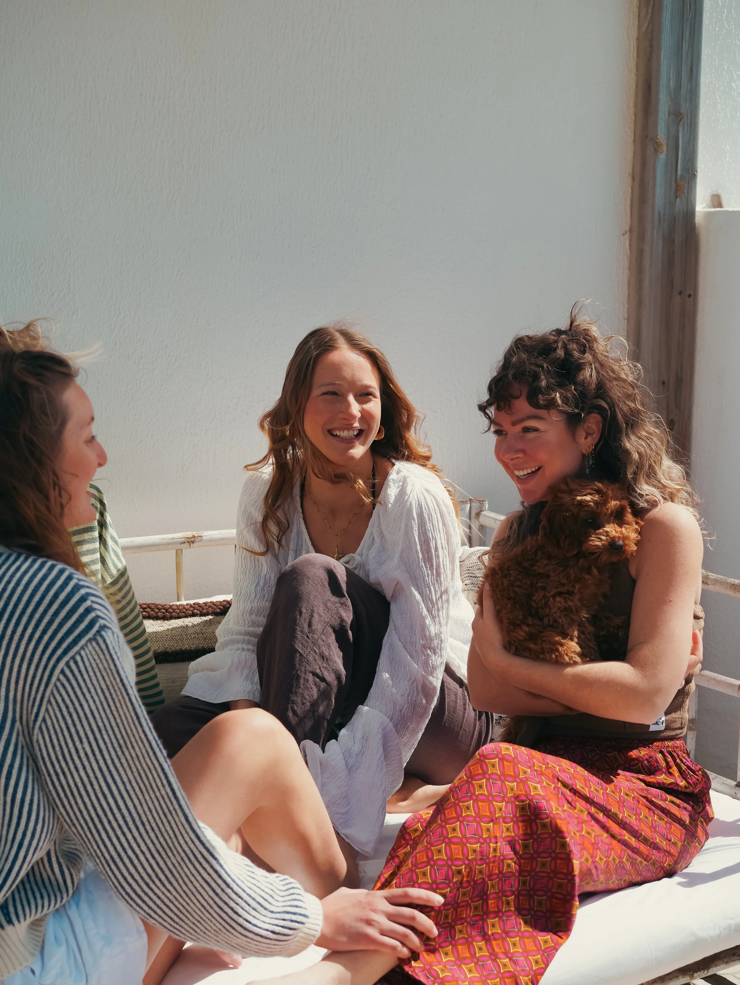 Group of women enjoying a surf retreat in Portugal