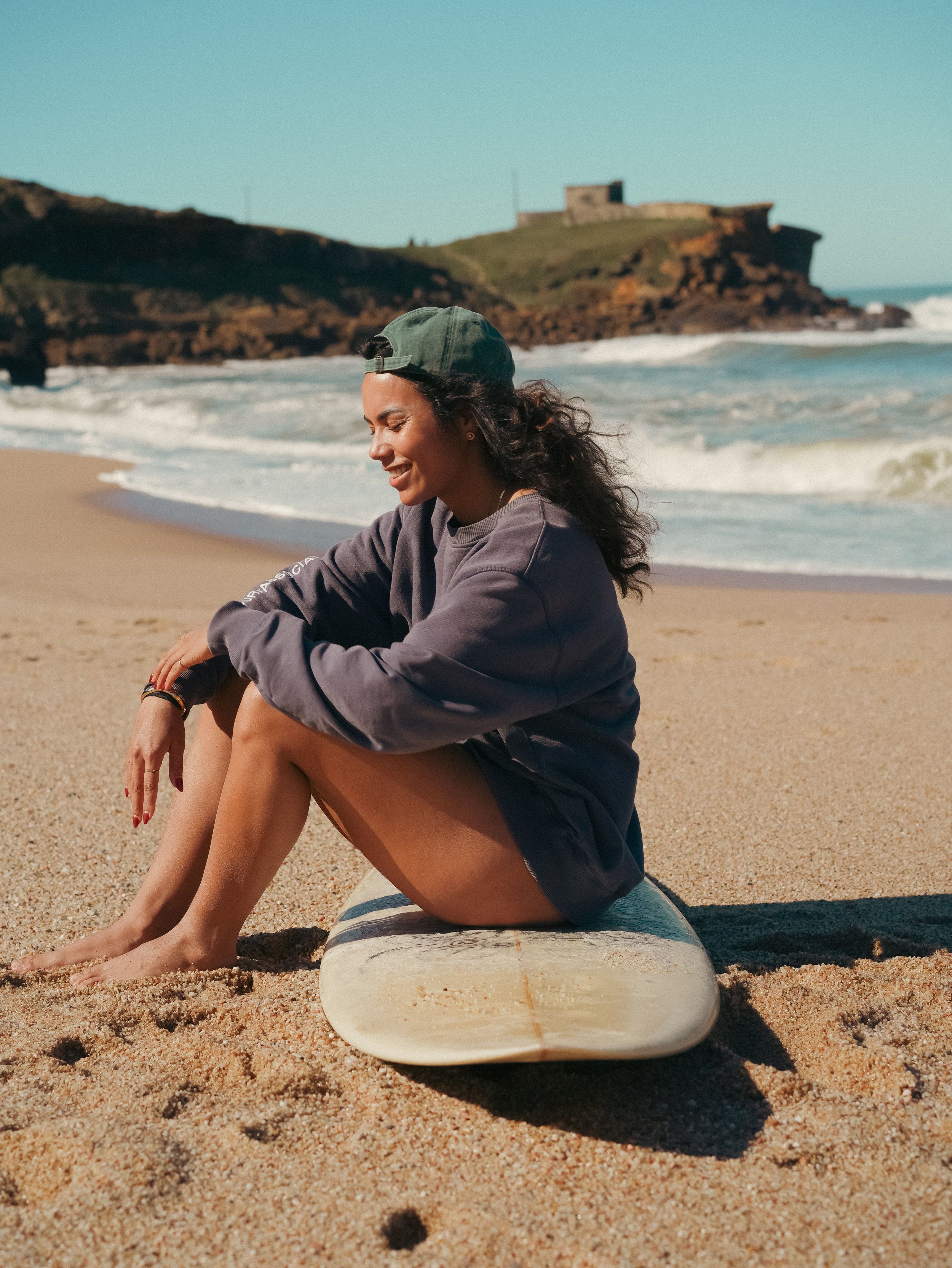 Women relaxing on the beach during retreat Portugal