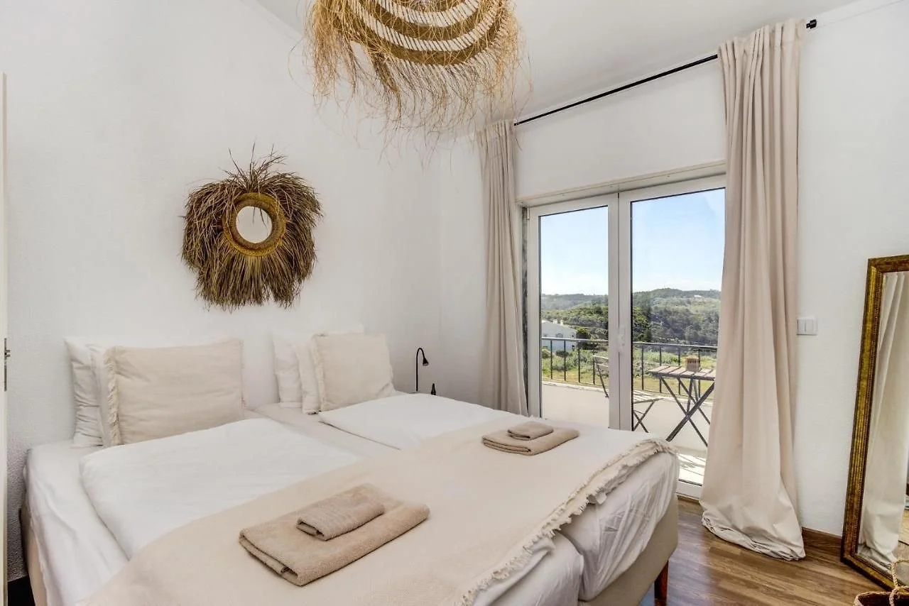 Cozy room at women’s surf retreat Portugal