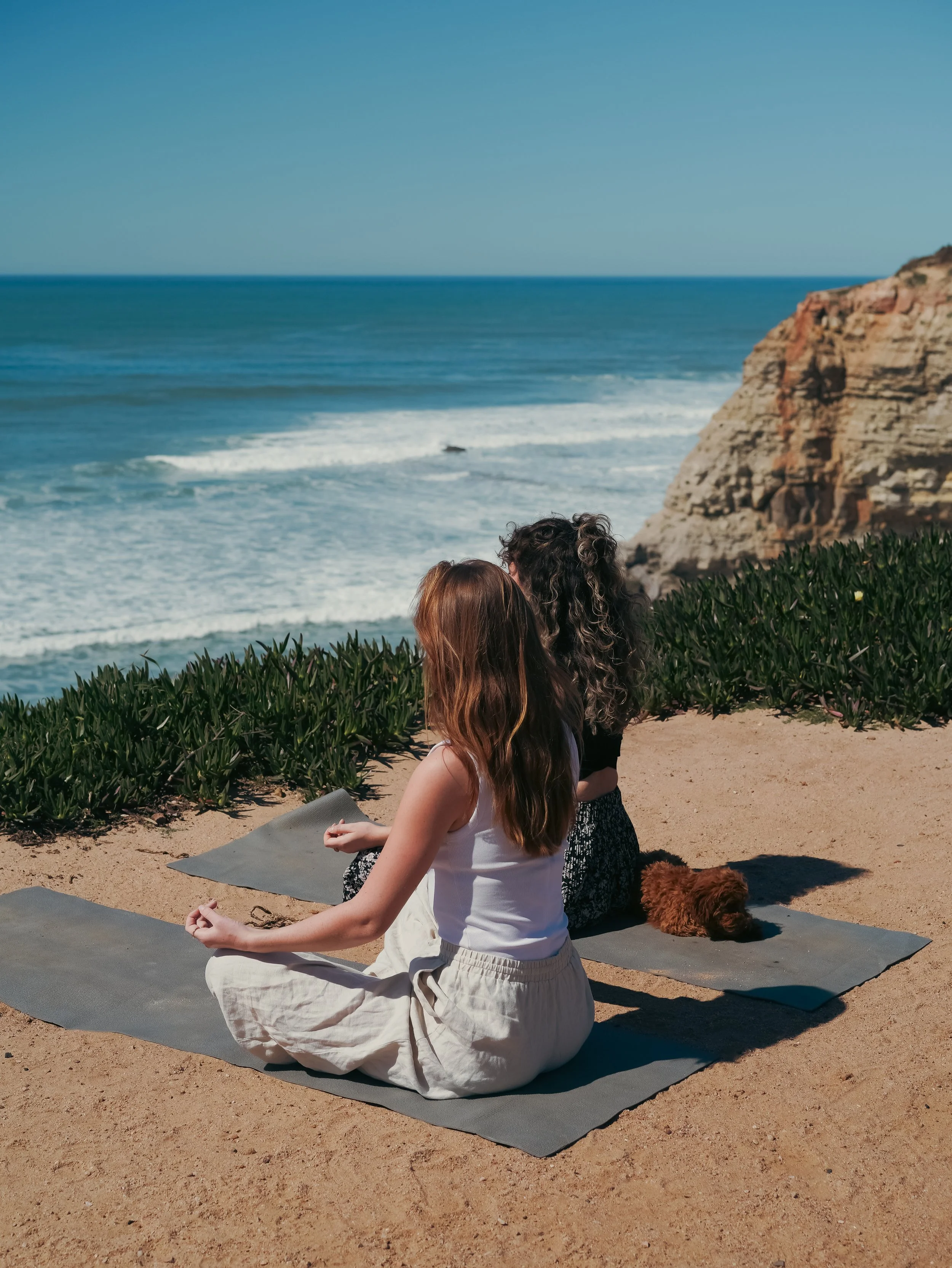 Outdoor yoga with ocean view Portugal retreat