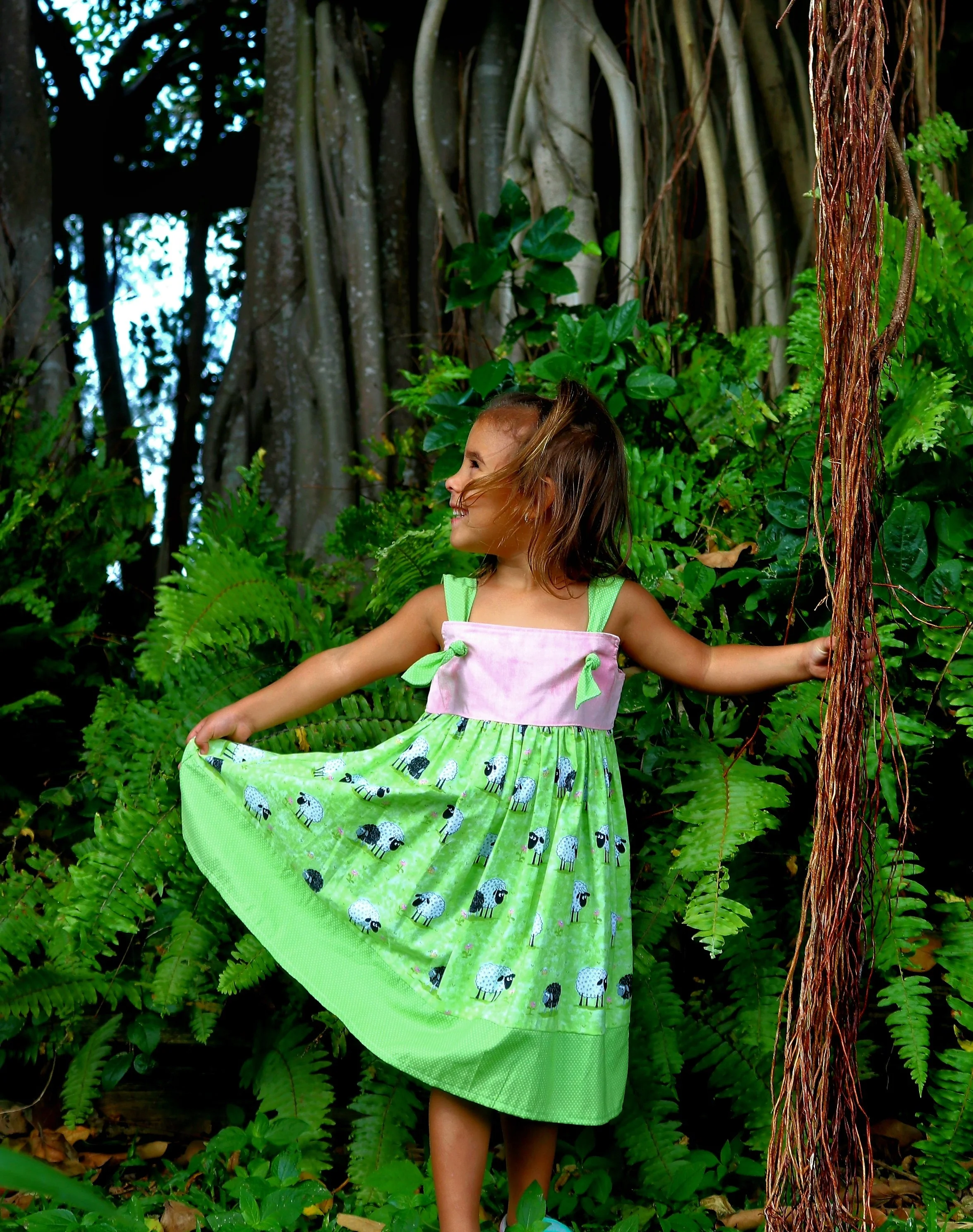 4 year old model with green sheet dress