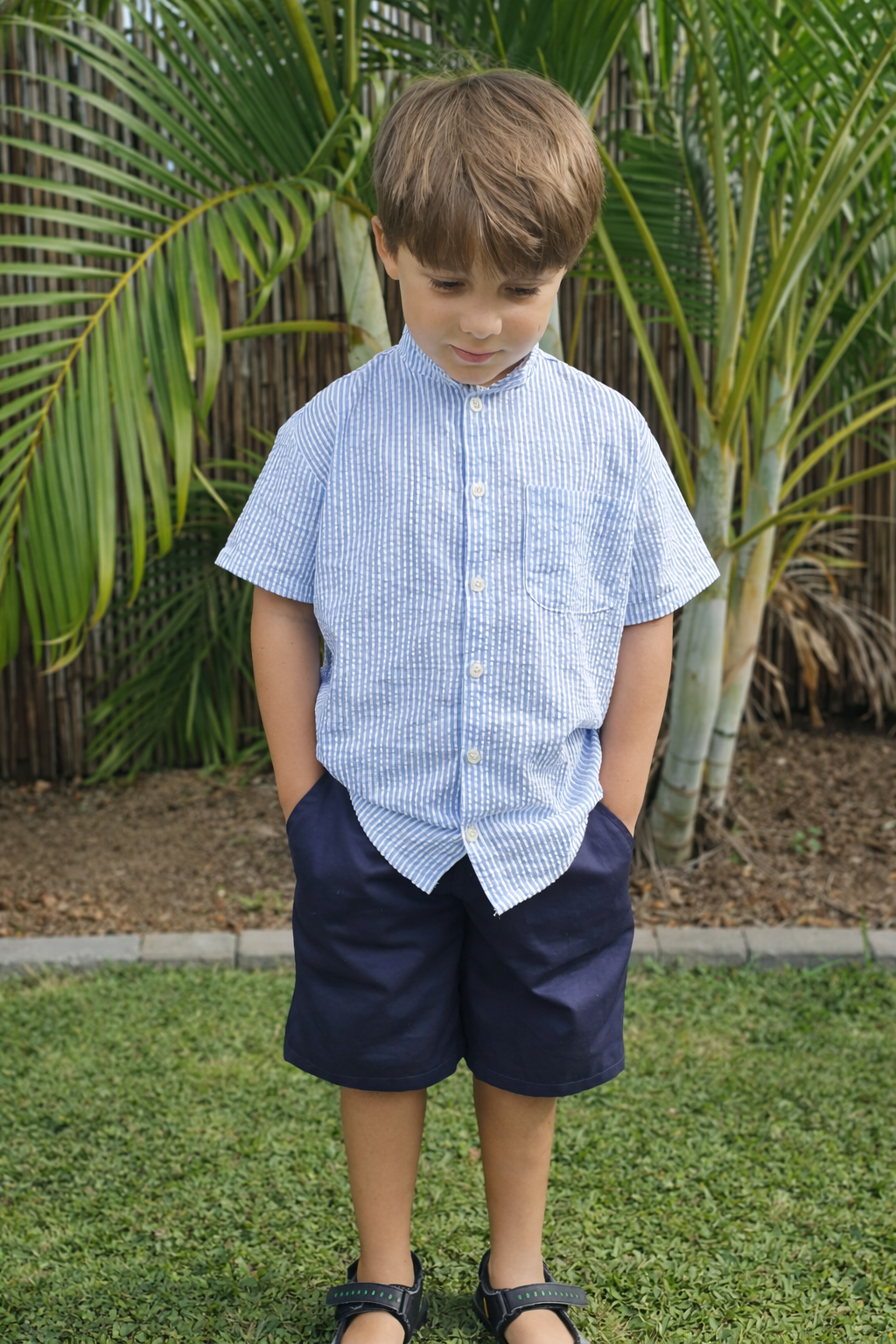 Blue shirt boys front.png