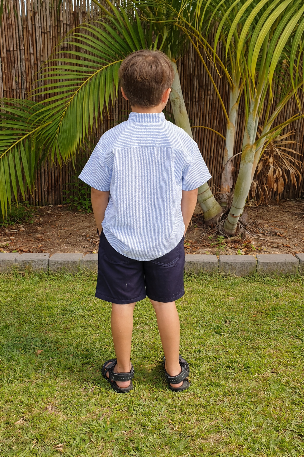 Blue shirt boys back.png