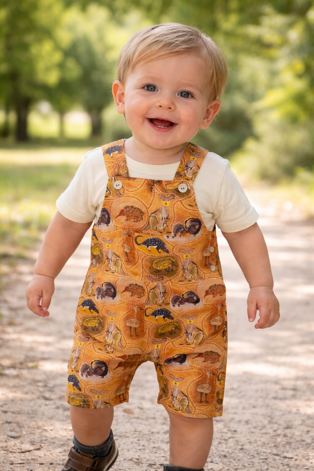 Baby displaying Australiana romper