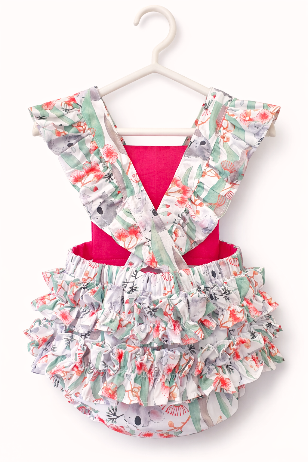 Back view of Australian Koala Blossom handmade baby romper with ruffle detail