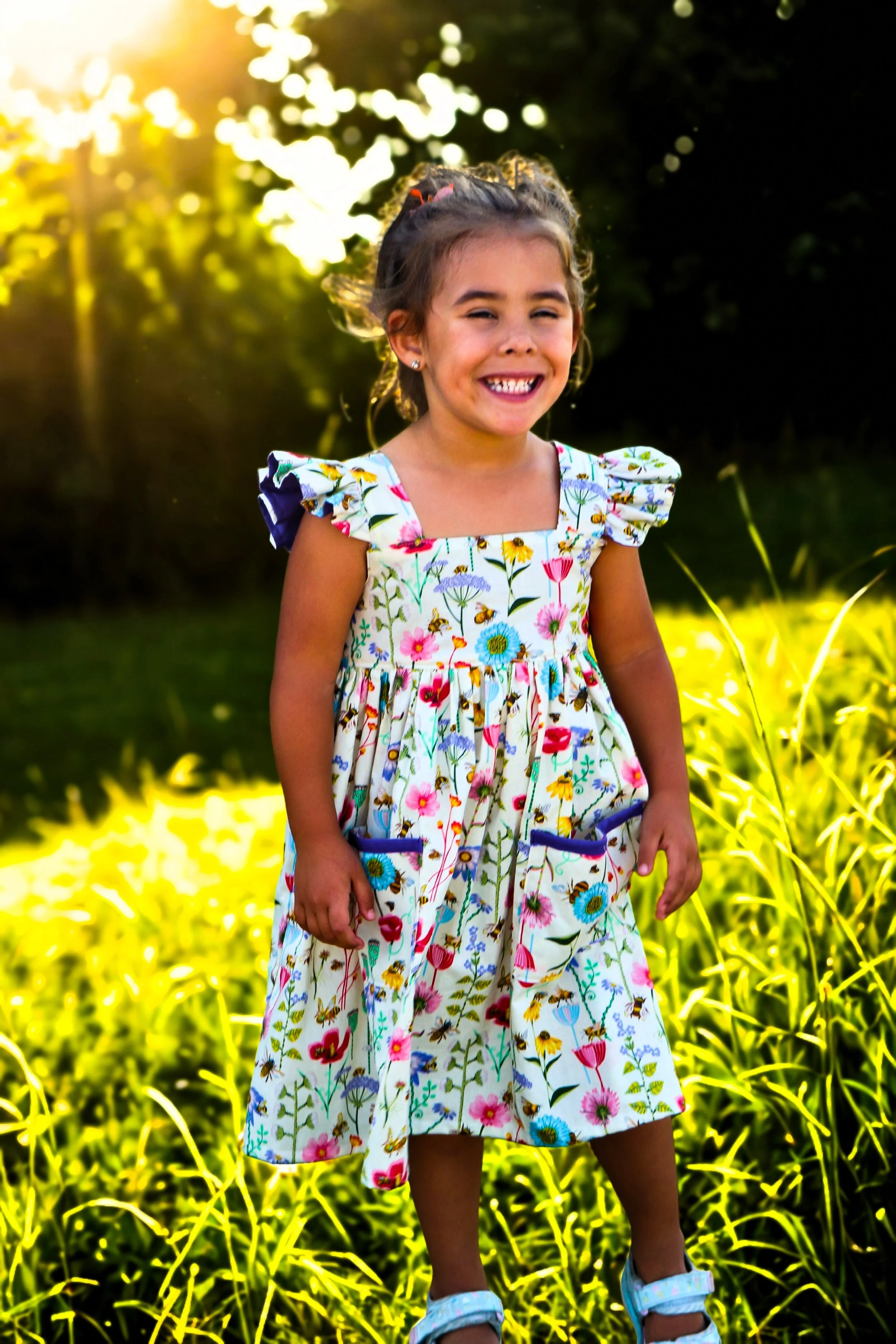 Girl displaying elegance handmade dress
