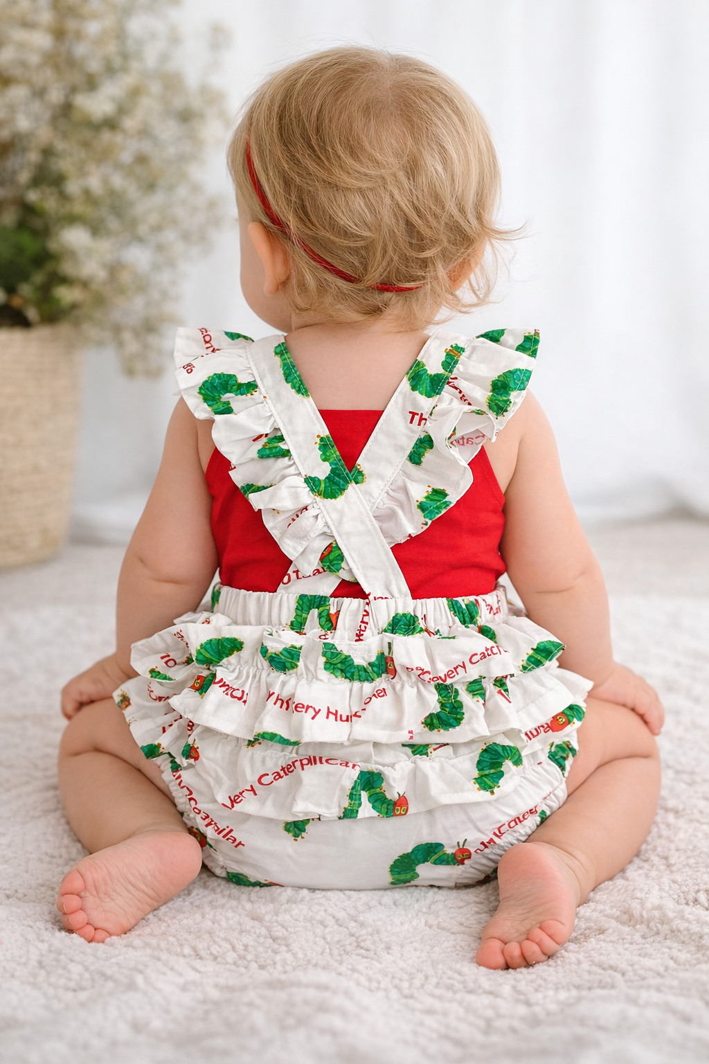 Back of hungry caterpillar romper.png