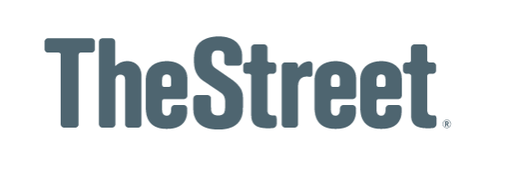 The logo of TheStreet, with the words 'The' and 'Street' in dark gray and '&' in light gray, on a black background.