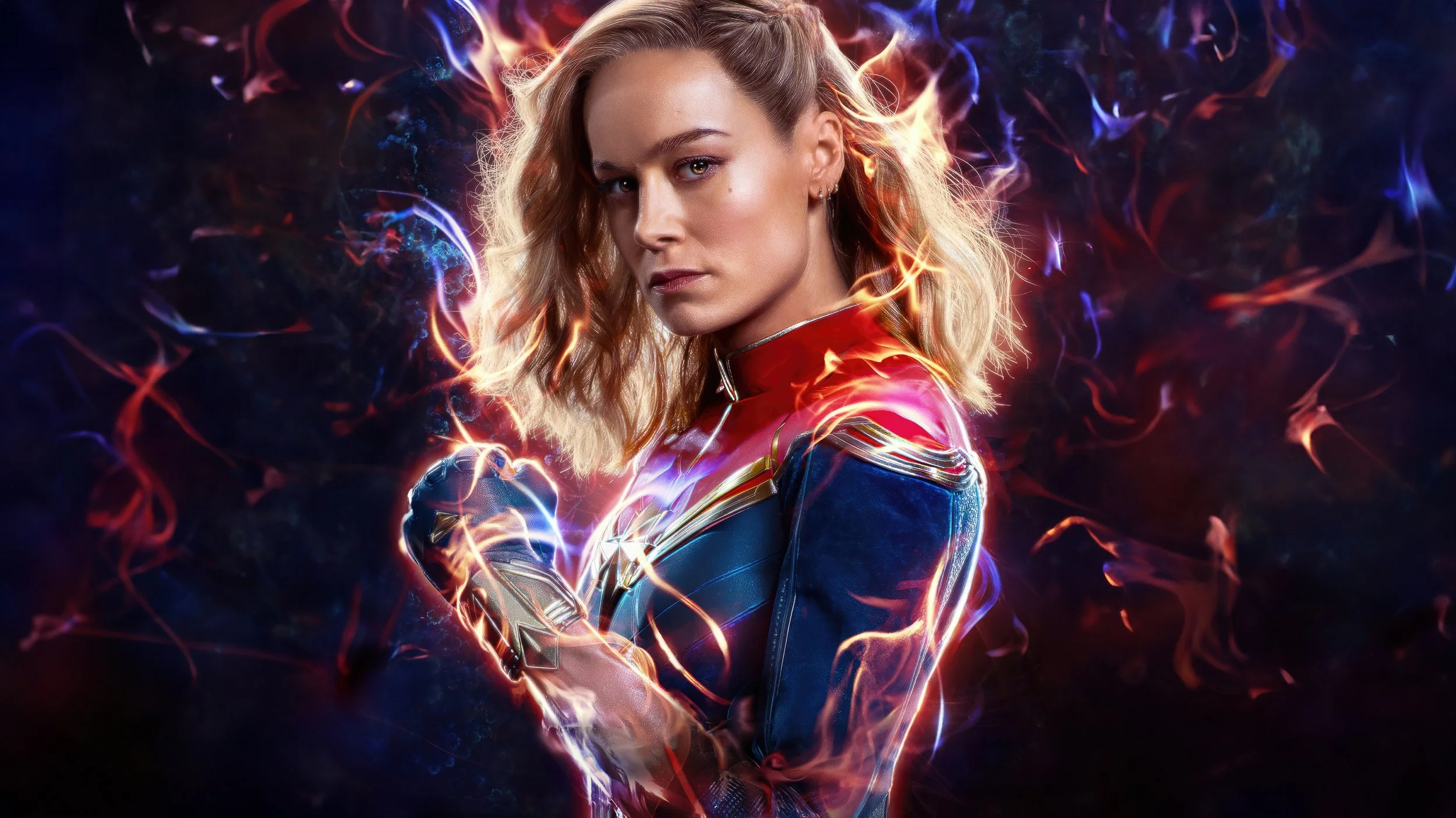 A woman in a superhero costume with fiery effects and energy surrounding her, in a confident pose.