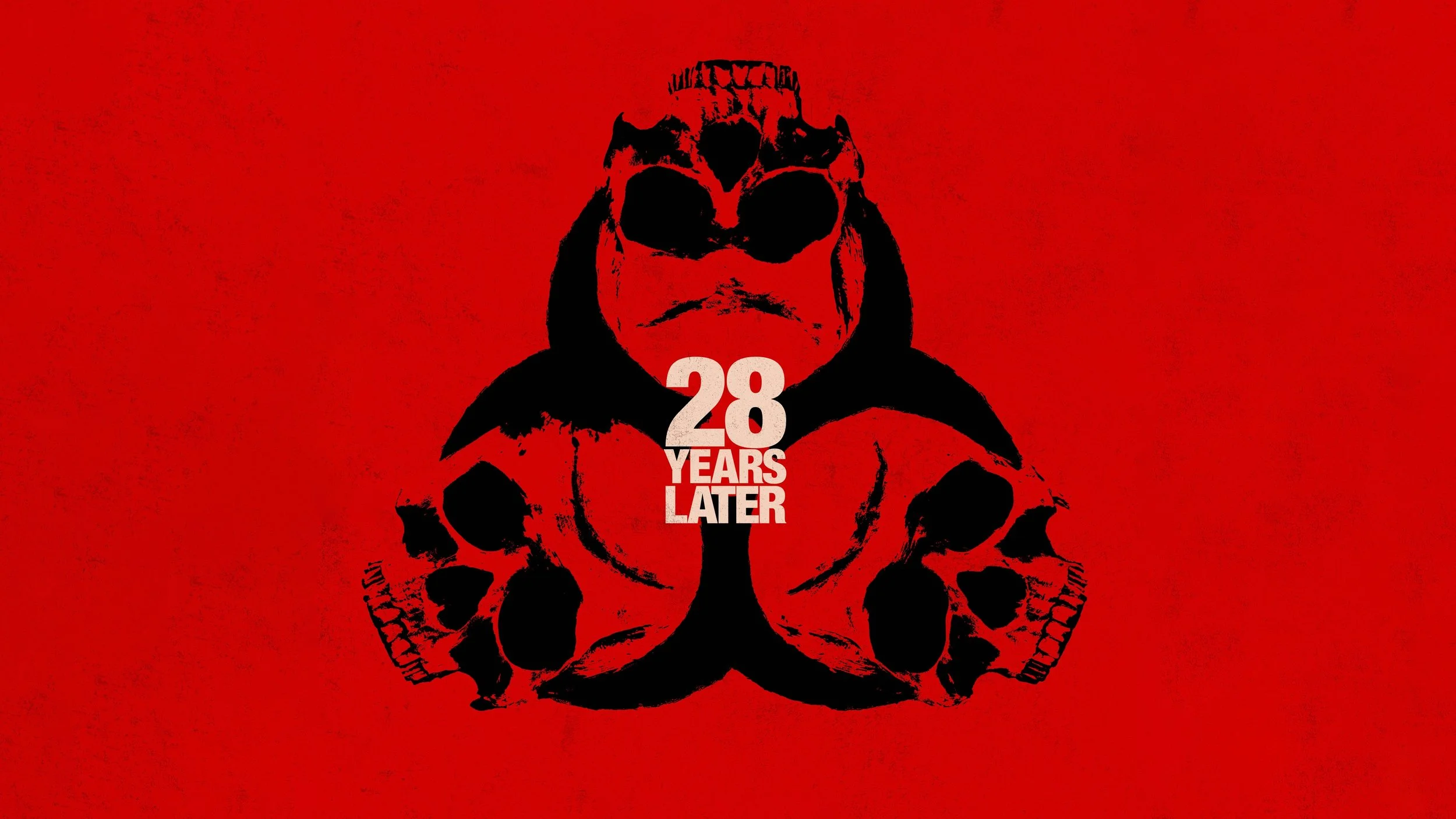 Black biohazard symbol and skulls on red background with white text reading '28 years later'