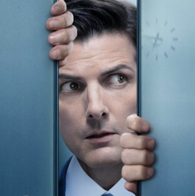 Man peeking through a narrow gap between two blue lockers or doors, with a clock visible in the background.