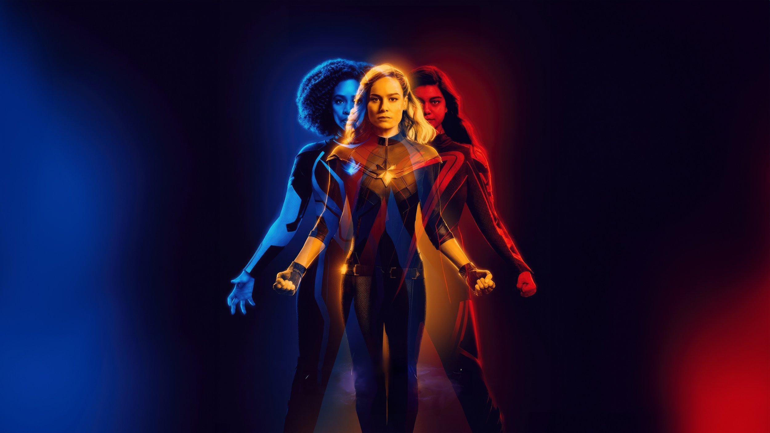 A digitally manipulated promotional poster featuring three women in superhero costumes, backlit with blue, red, and yellow lights, standing with fists clenched.