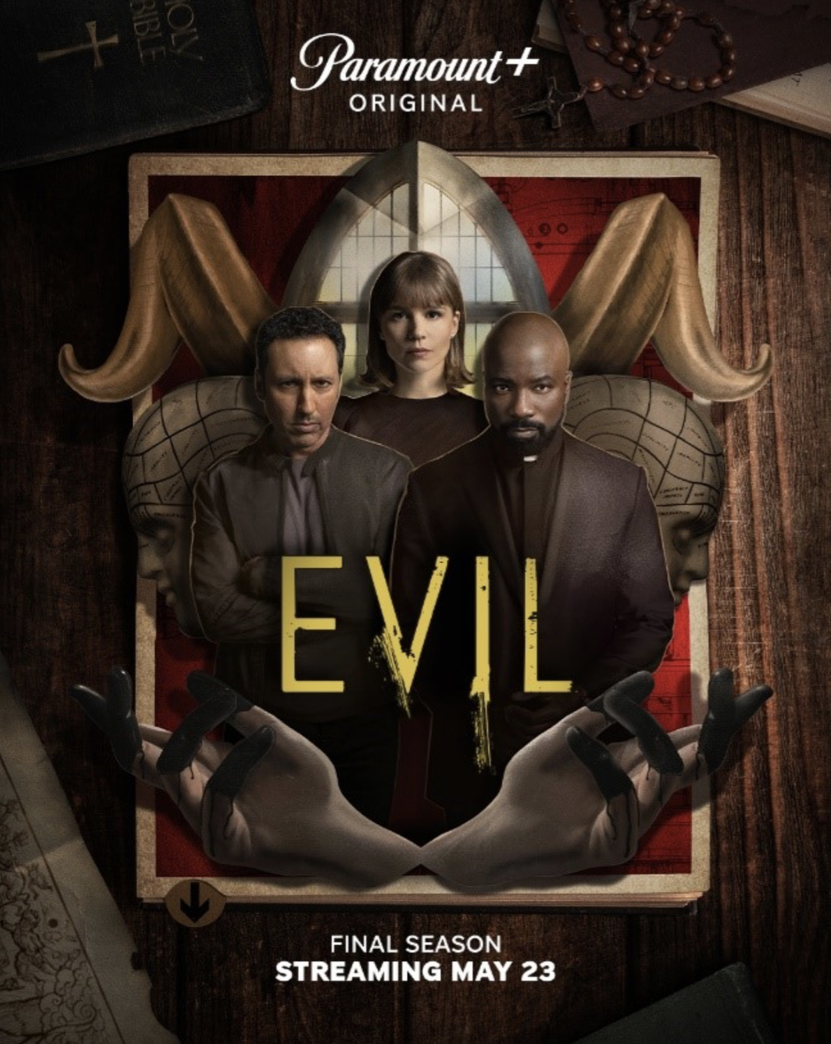 Promotional poster for the final season of the TV show "Evil" streaming on Paramount+ starting May 23. The poster features three characters with serious expressions, and supernatural elements including large wings and a hand with black nails, set aga