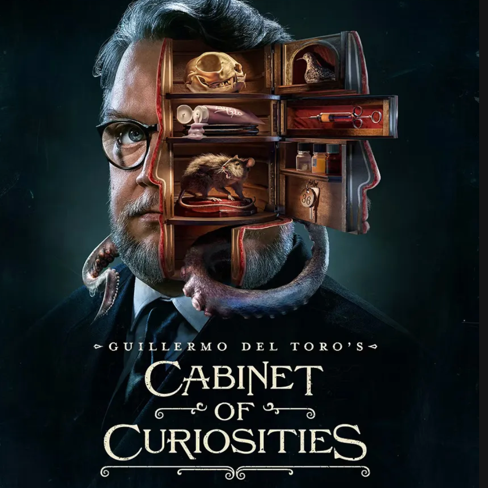 A promotional poster for "Cabinet of Curiosities" featuring a man's face with a cutaway revealing a collection of odd objects including a skull, bird, scissors, rat, and other curiosities inside his head, with the text "Open Your Mind to Fear" at the