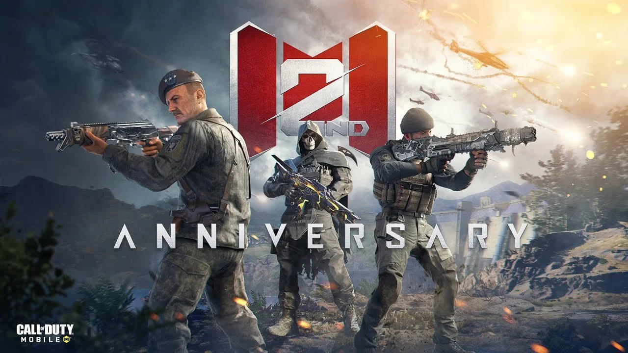 Four armed soldiers in combat gear facing forward with two pointing weapons, set against a battlefield background with helicopters and explosions, featuring a large red and white logo and the words '11th Anniversary' and 'Call of Duty Mobile'.