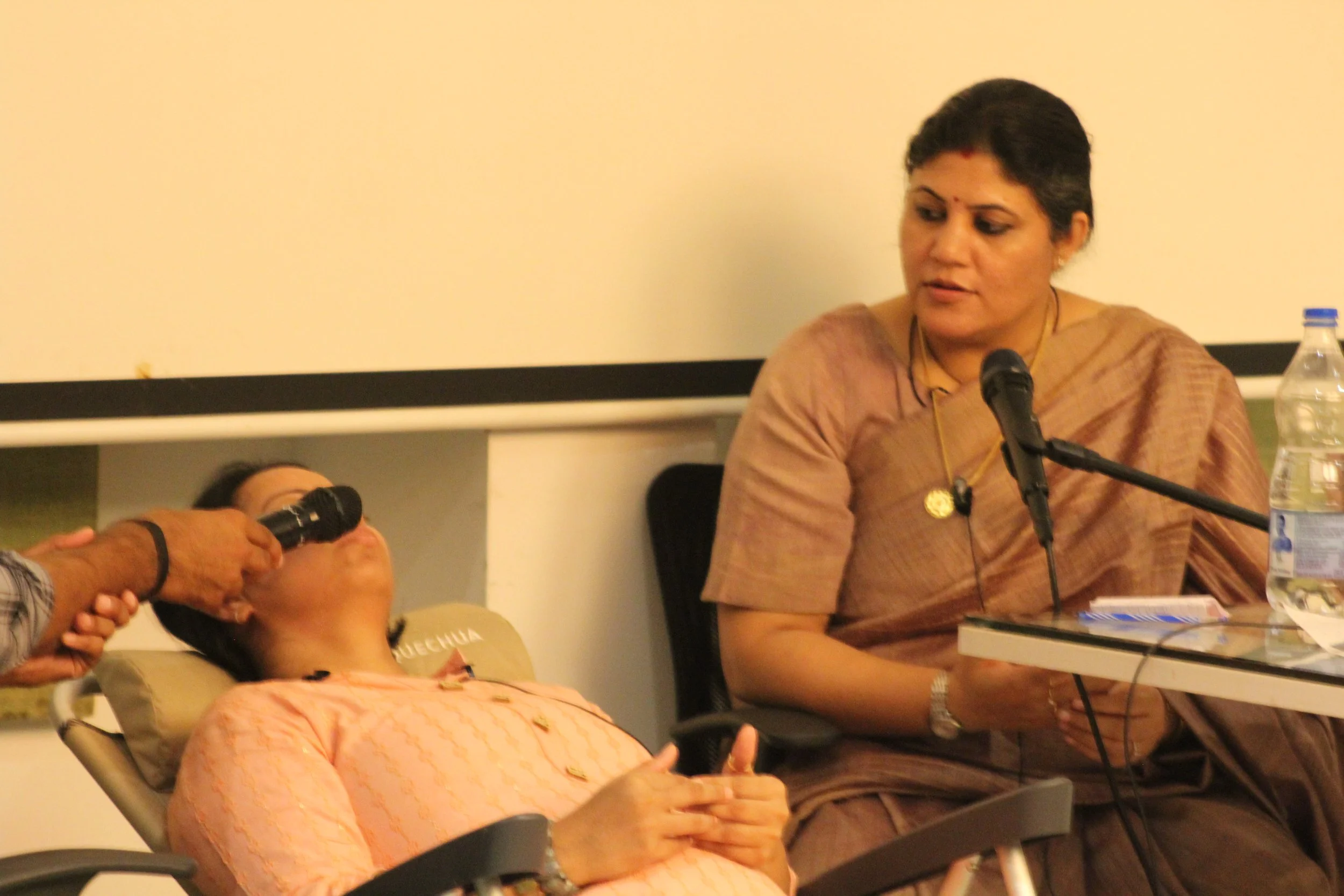 Dr Rashhi Sharma conducting a demo Past Life Regression session.