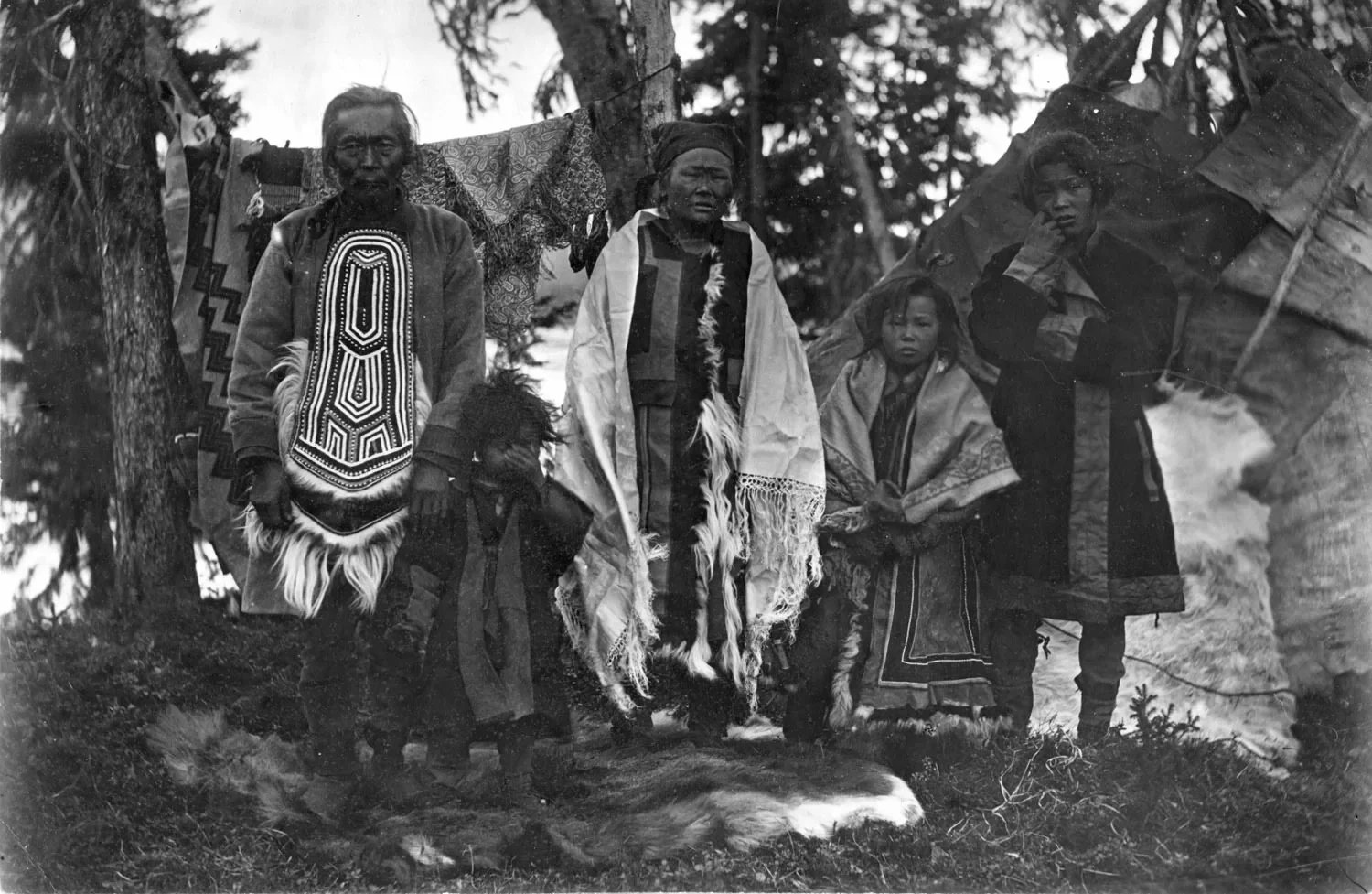 Evenki family photographed near the Podkamennaya Tunguska River, 1907.