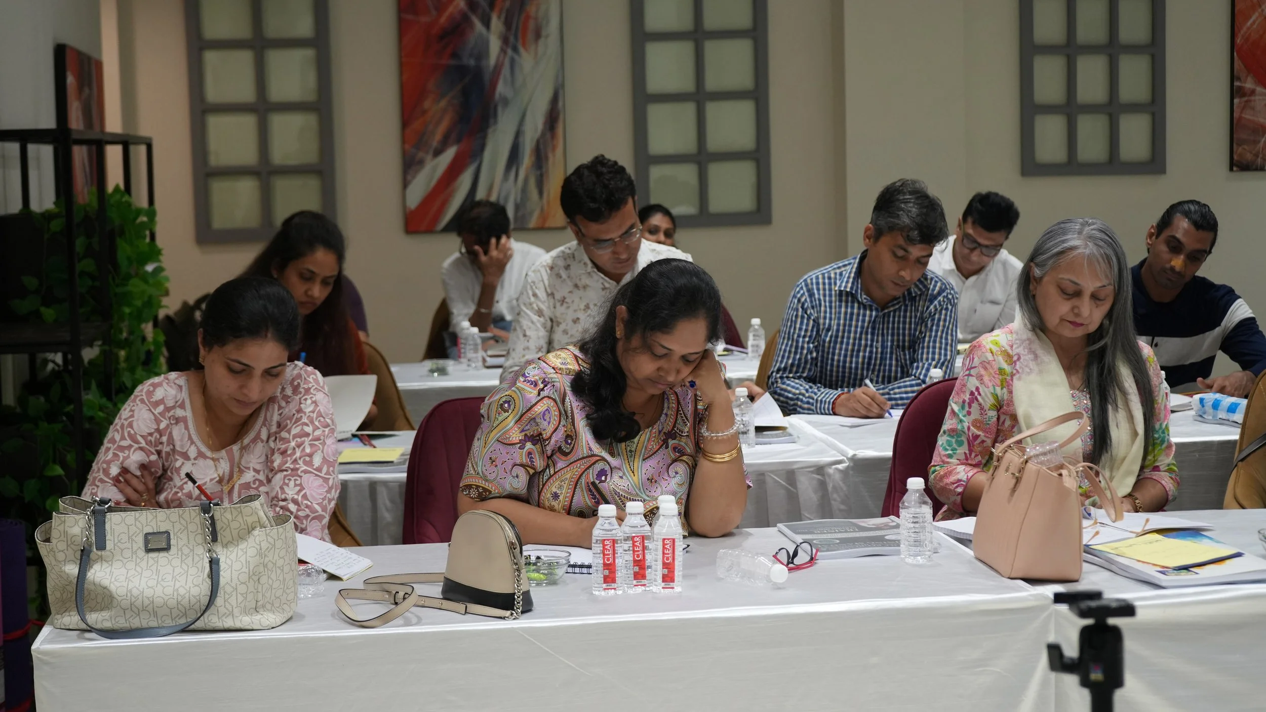 Students of Past Life Regression training are attending the training.