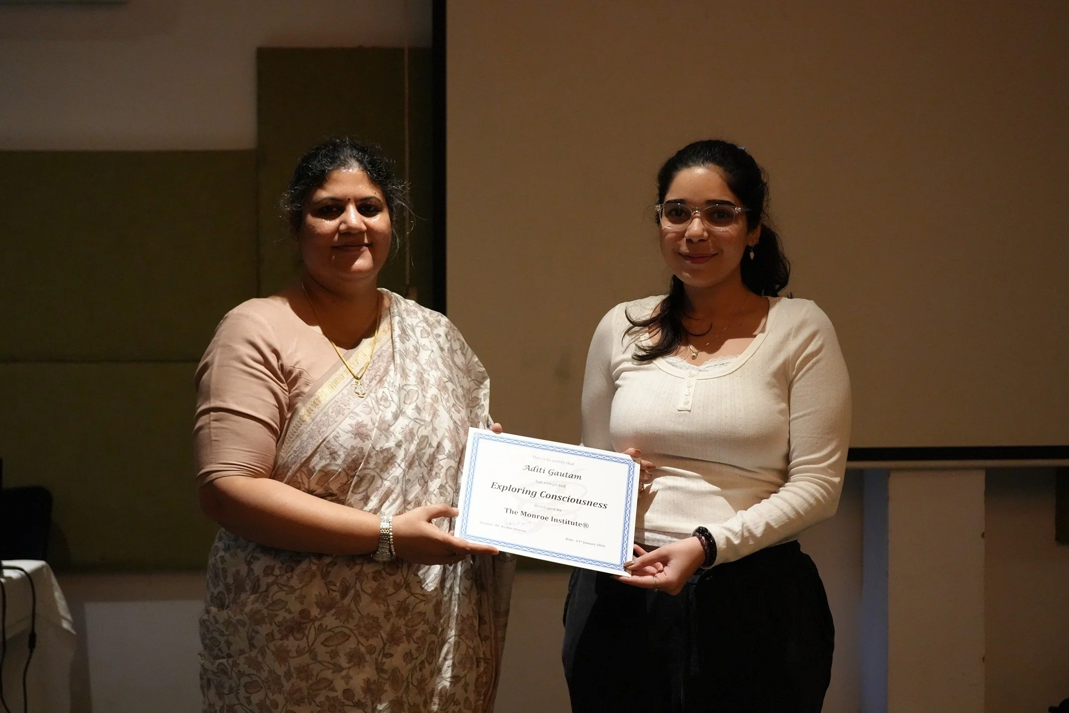Student receiving Monroe Institute certificate