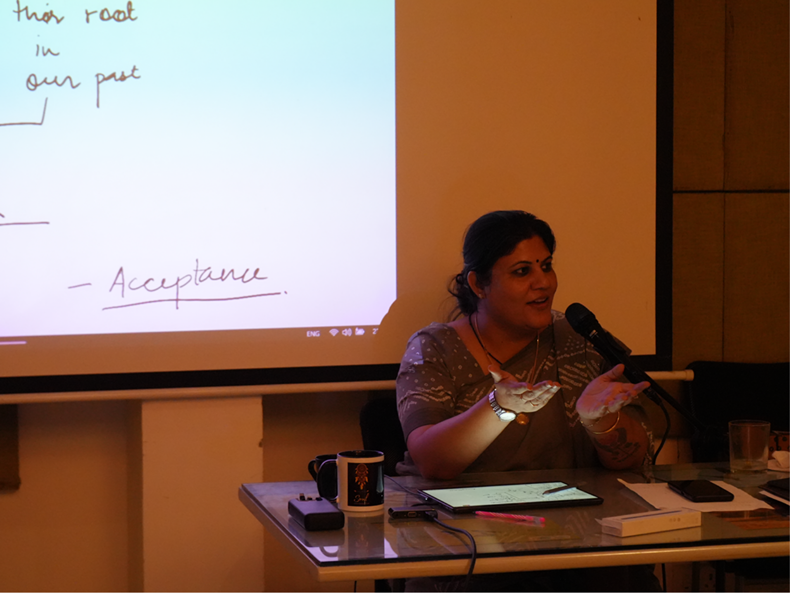 Dr Rashhi Sharma teaching a class of hypnotherapy