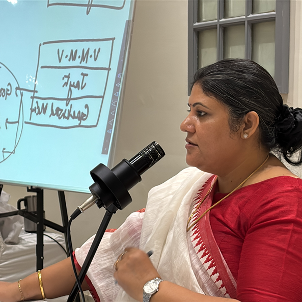 Dr Rashhi Sharma teaching a class of NGH Hypnotherapy