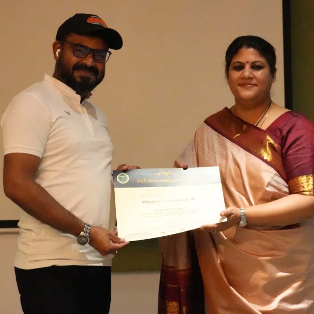 KD receiving past life regression practitioner certificate from Dr Rashhi Sharma.