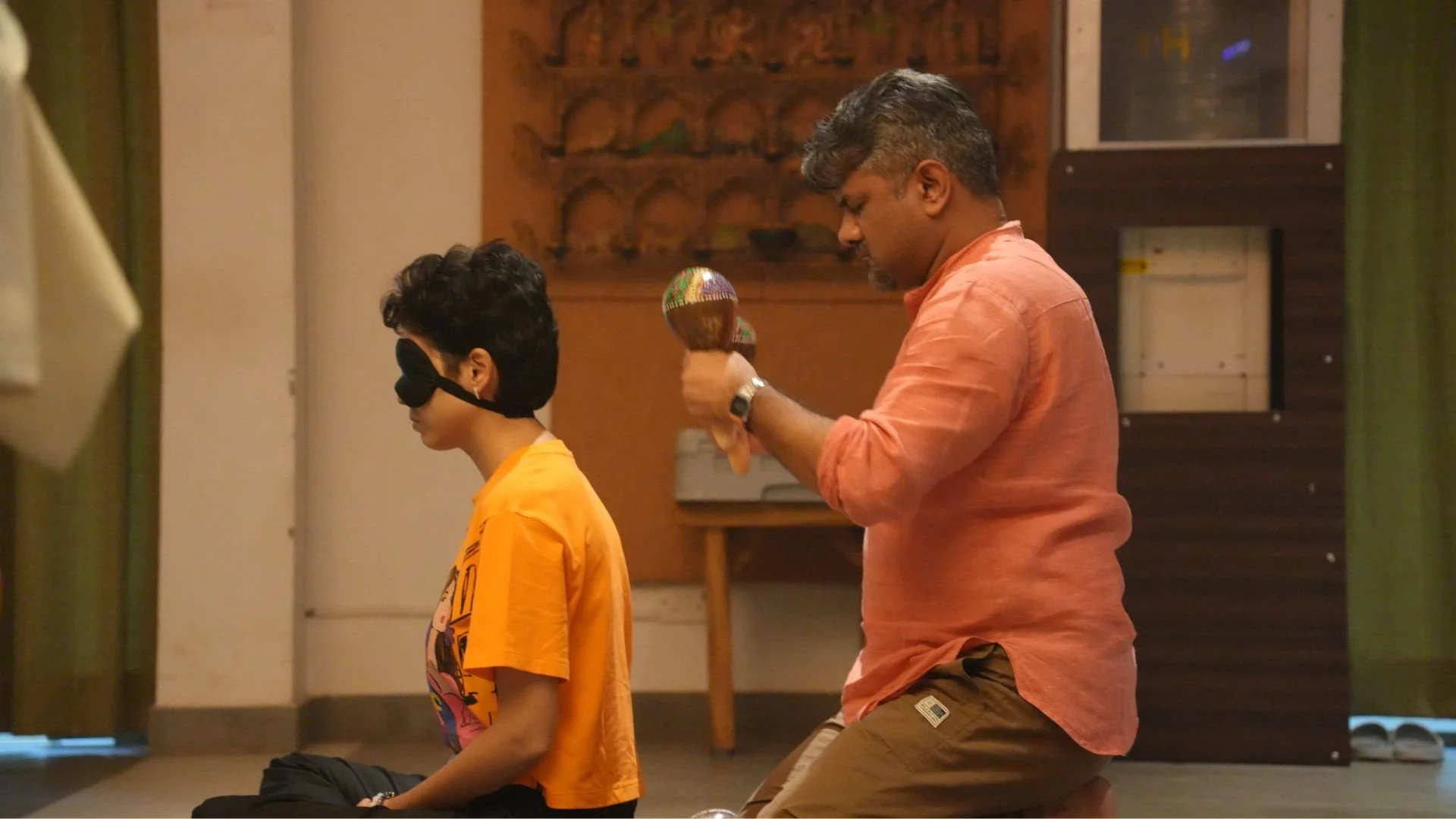 students practicing soul retrieval in pairs, in shamanism training