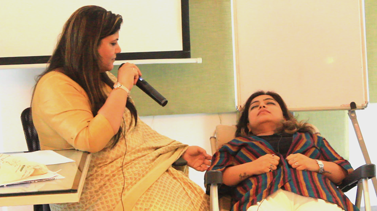 Dr Rashhi Sharma conducting a demo session during training.