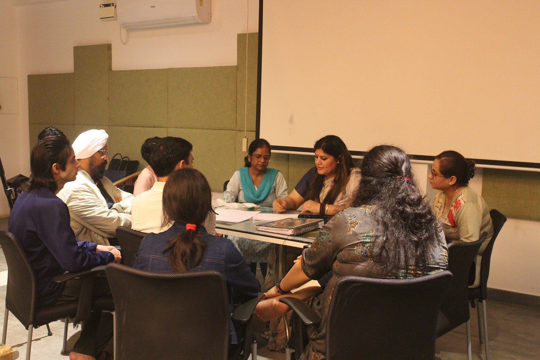 Dr Rashhi Sharma teaching students of PLR training