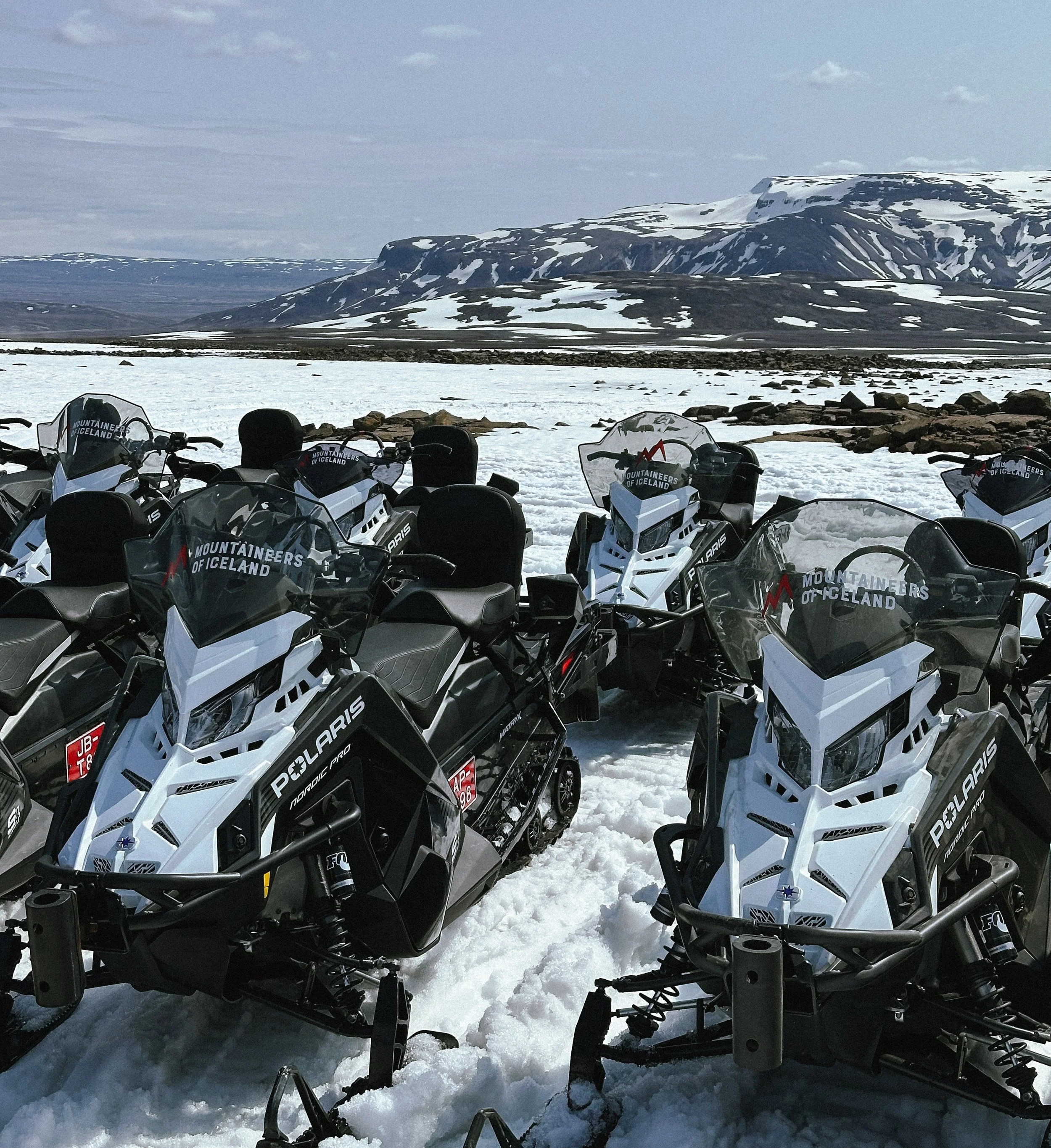 Multiple snowmobiles with 