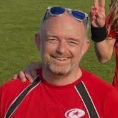 Guy - grumpy dad. Somebody give him a hug. One eye roll away from losing it completely.