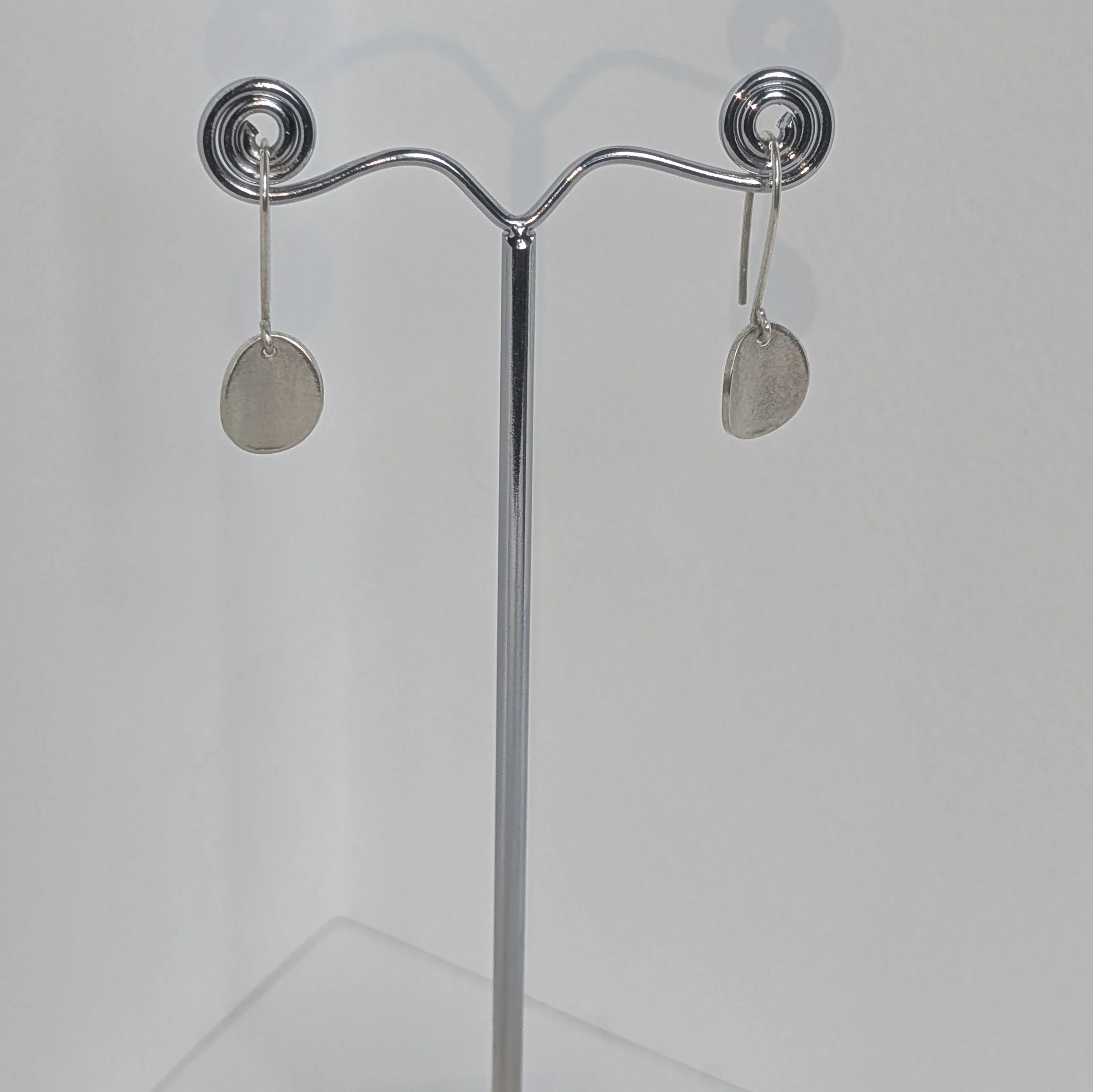 Medium oval drop earrings, hanging.jpg