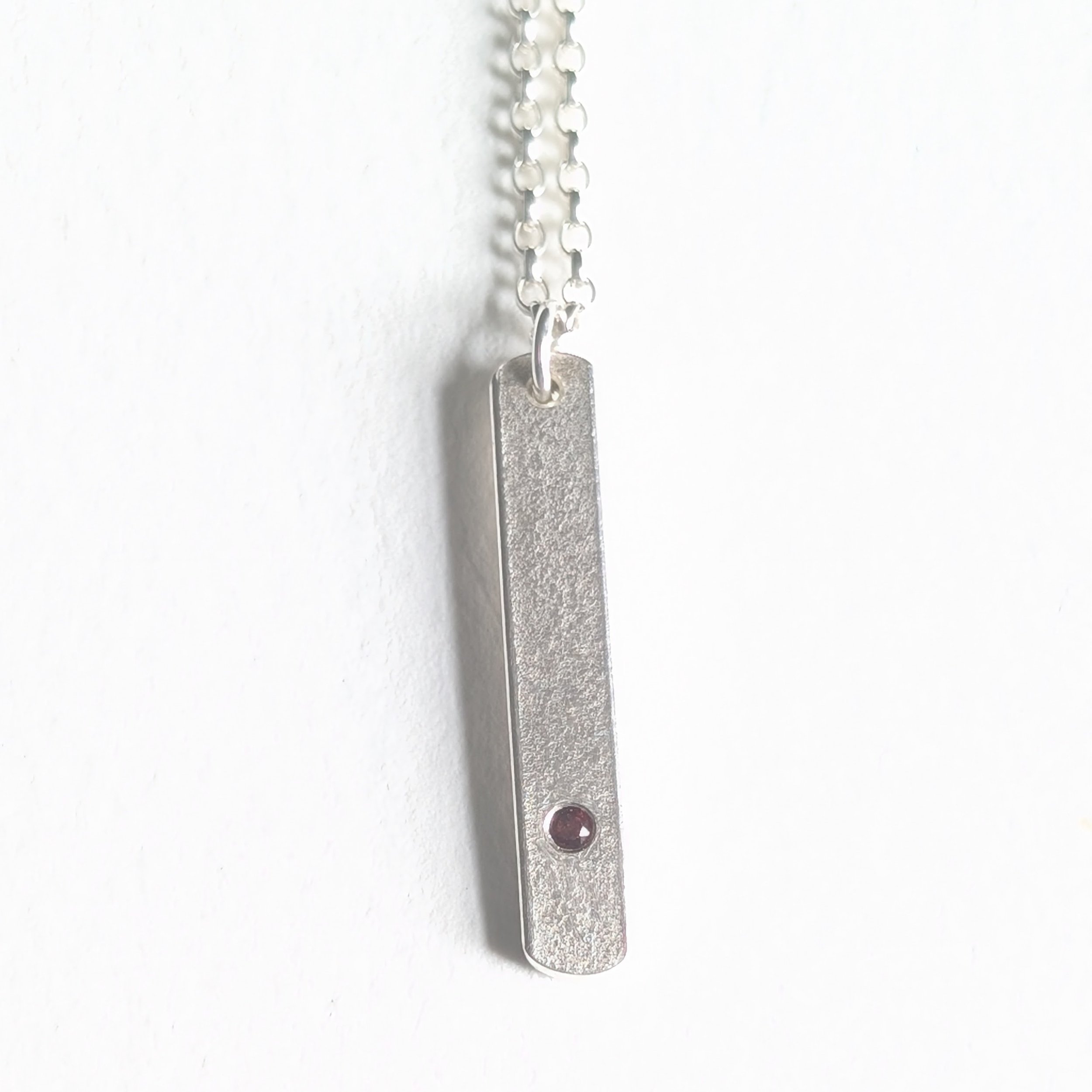 Rectangular pendant with garnet.jpg