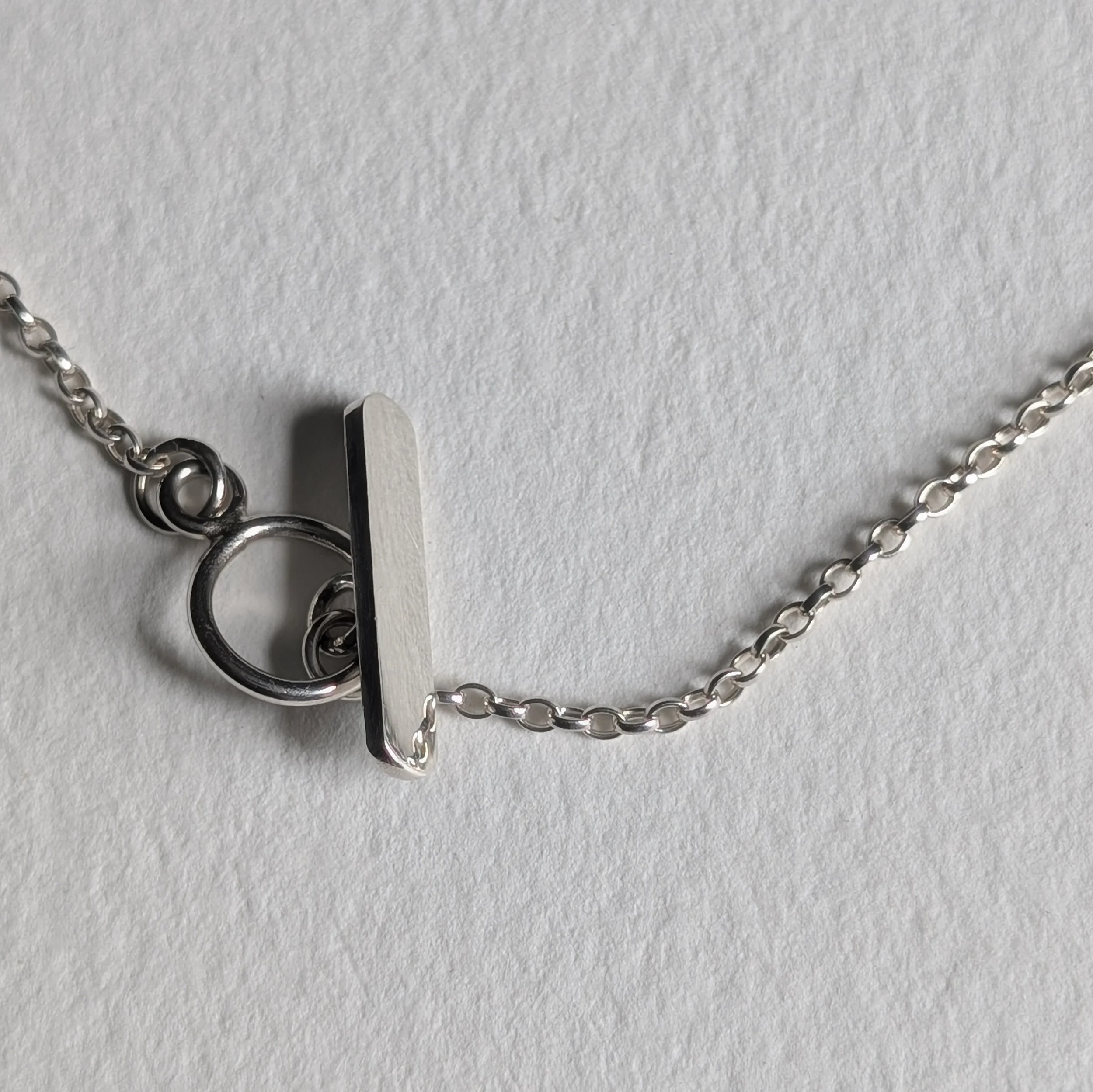 Rectangular pendant with aquamarine - t-bar detail.jpg