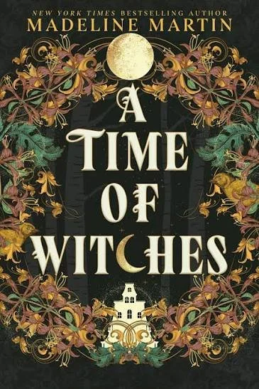Book cover for 'A Time of Witches' by Madeline Martin, featuring floral and foliage patterns, a full moon at the top, and a small white house at the bottom.