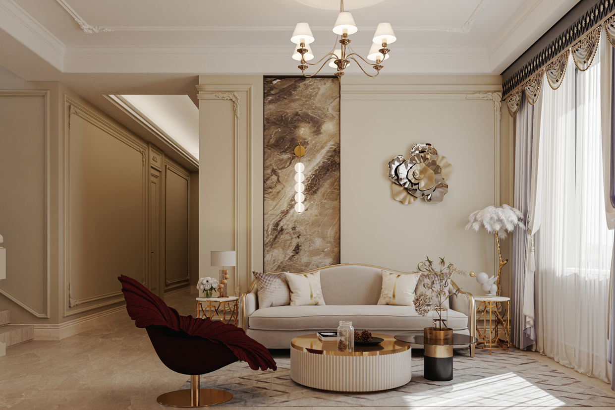 Elegant living room with a cream sofa, a red armchair, and a circular coffee table. Gold and white accents, a chandelier, and large window with draped curtains.