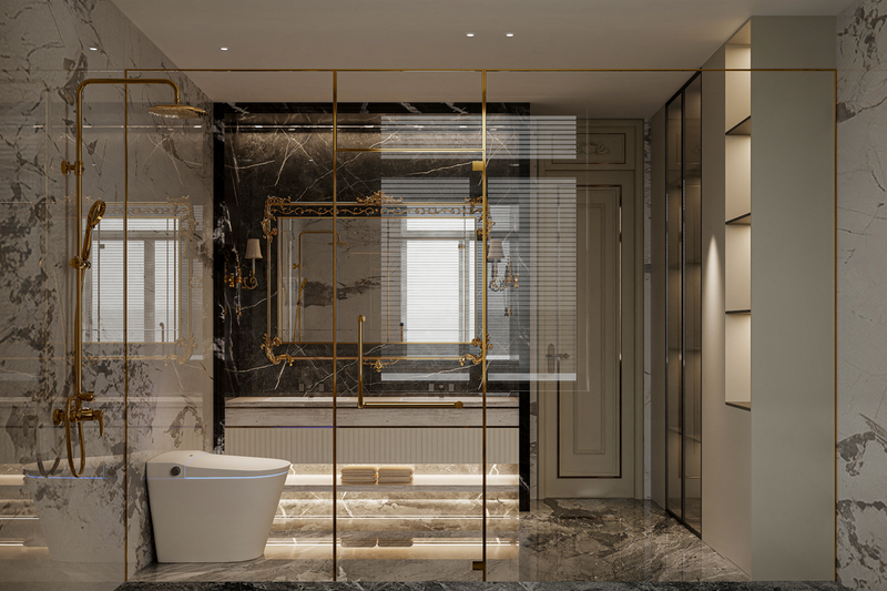 Luxurious bathroom with a glass-enclosed shower, gold fixtures, a modern toilet, marble walls, and a large mirror with window reflection.