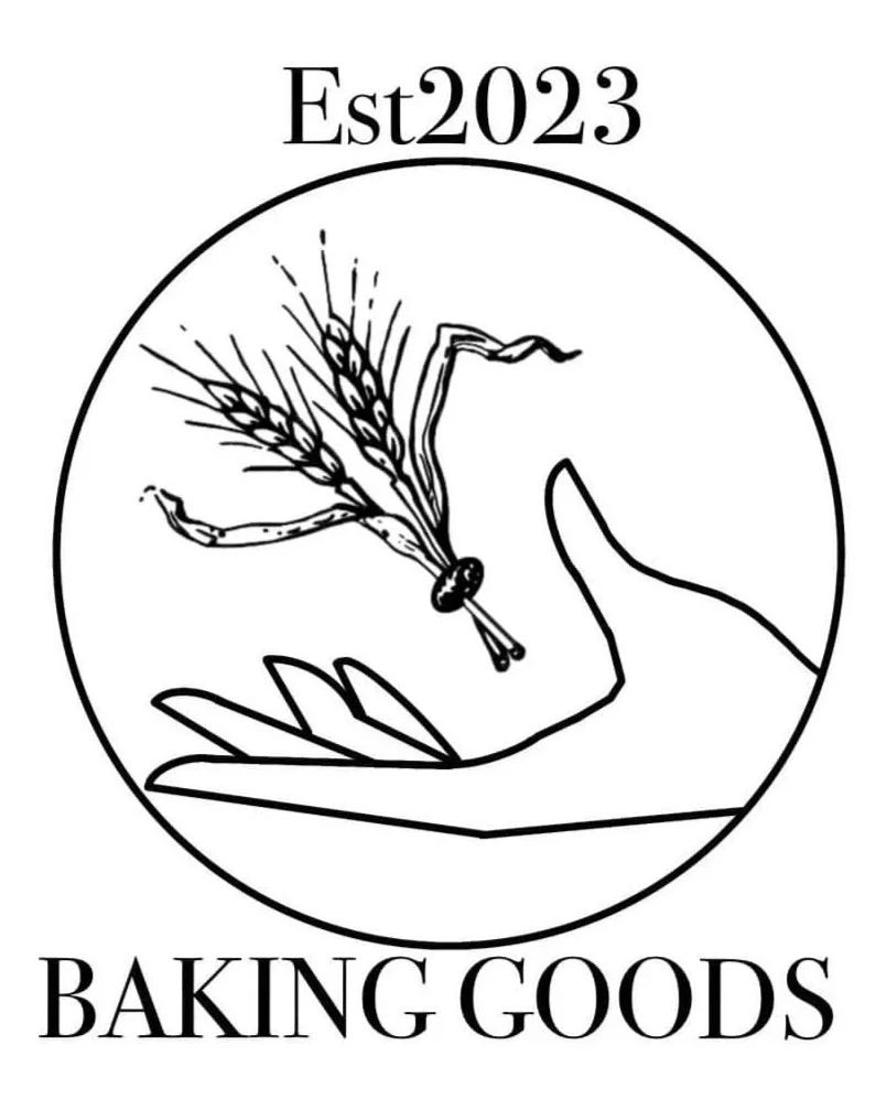 A logo featuring a hand holding a wheat bundle, with a circle enclosing the hand and wheat. The text "Est 2023" is at the top, and "Baking Goods" is at the bottom.
